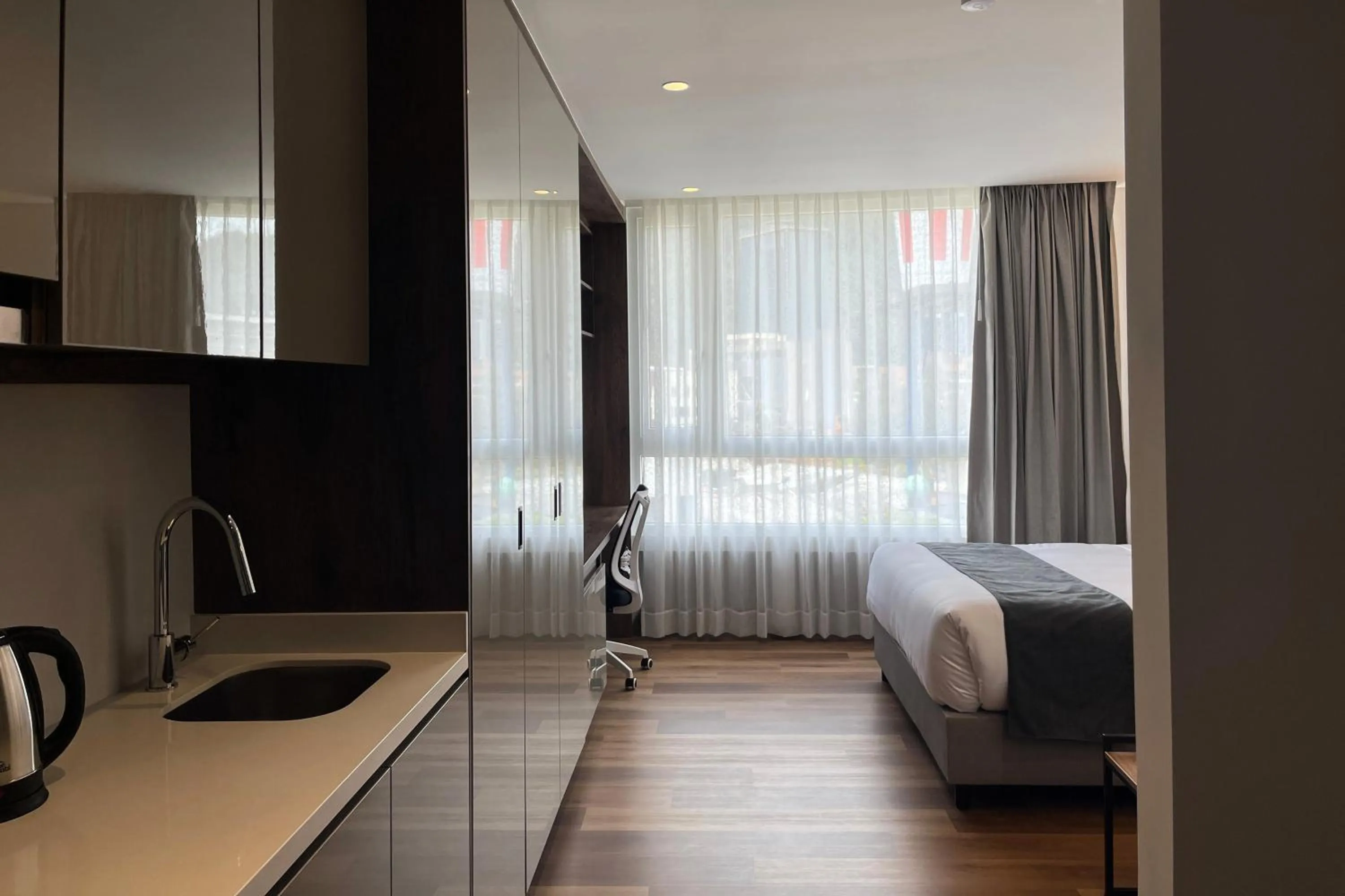 Bedroom, Bed in VOU Suites by Avia Suites