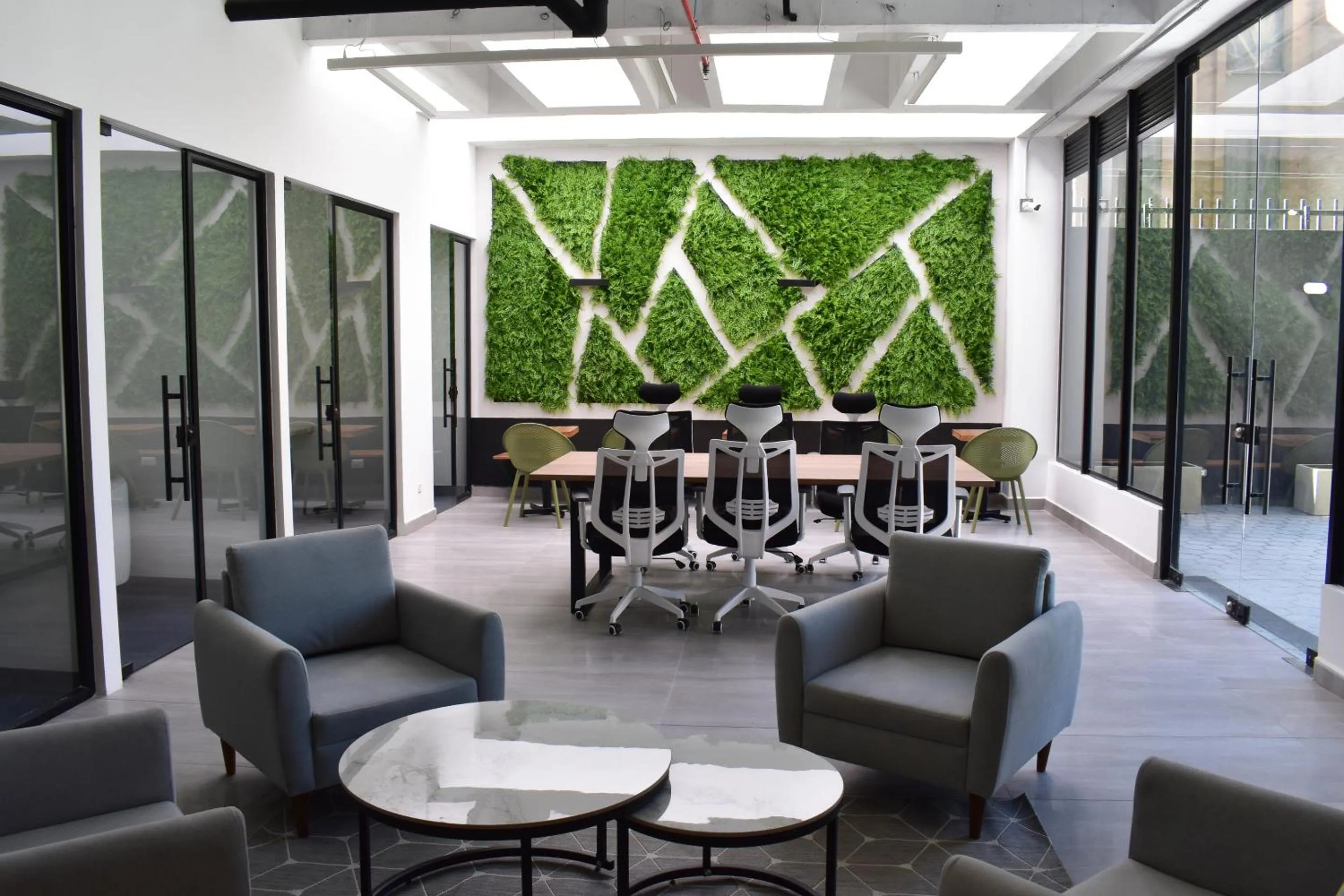 Seating area in VOU Suites by Avia Suites