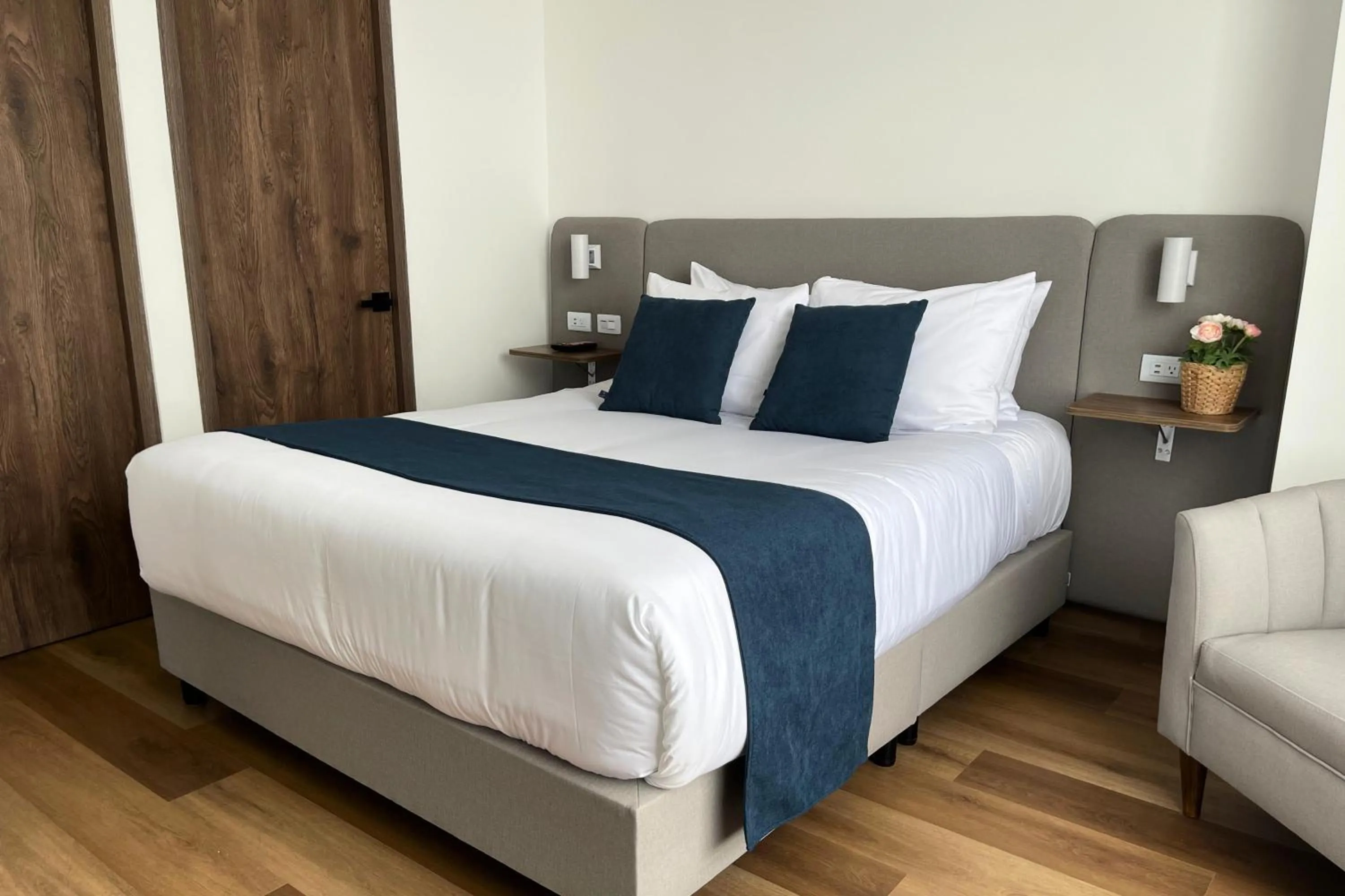 Bed in VOU Suites by Avia Suites