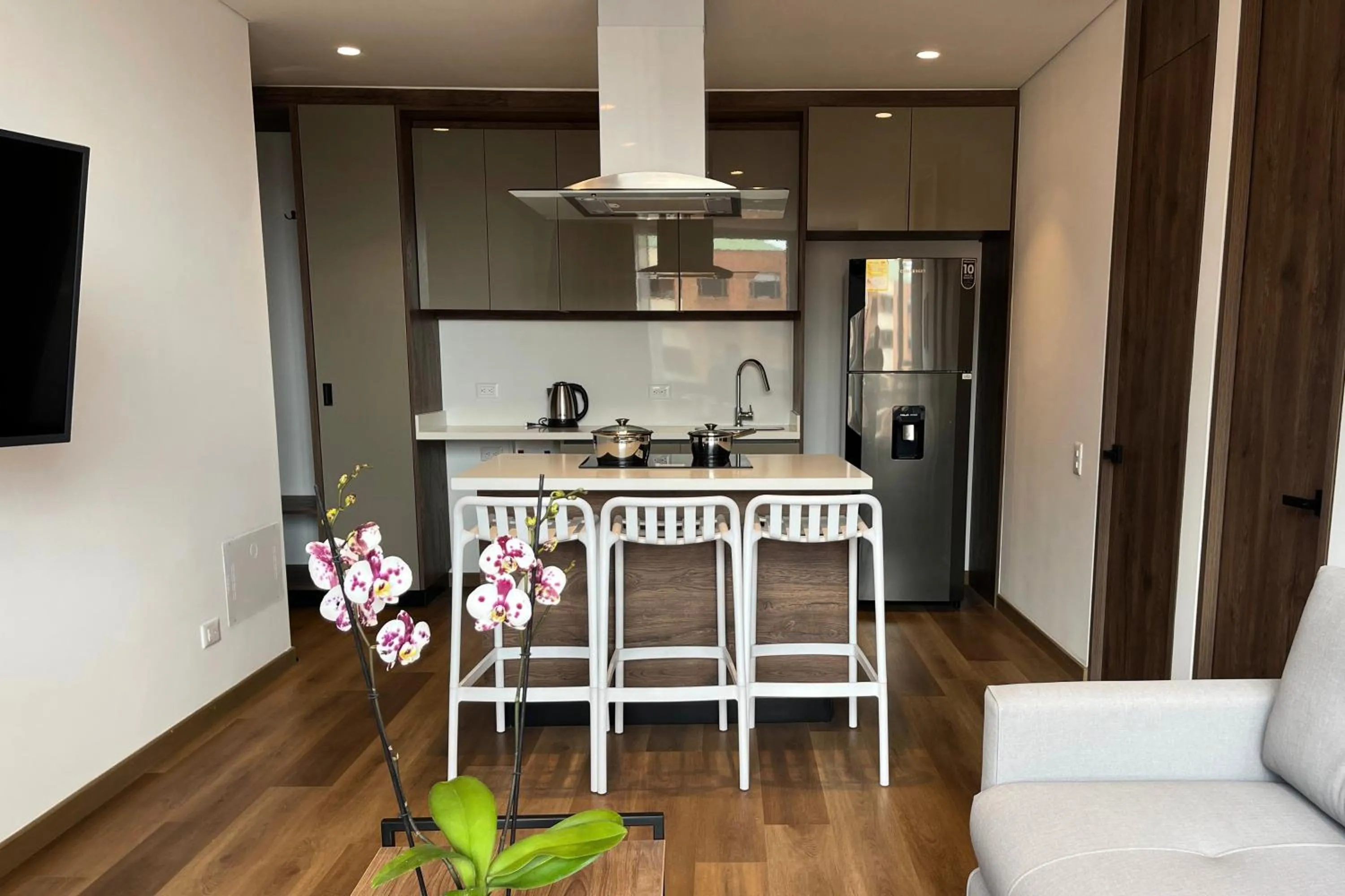 Kitchen or kitchenette in VOU Suites by Avia Suites