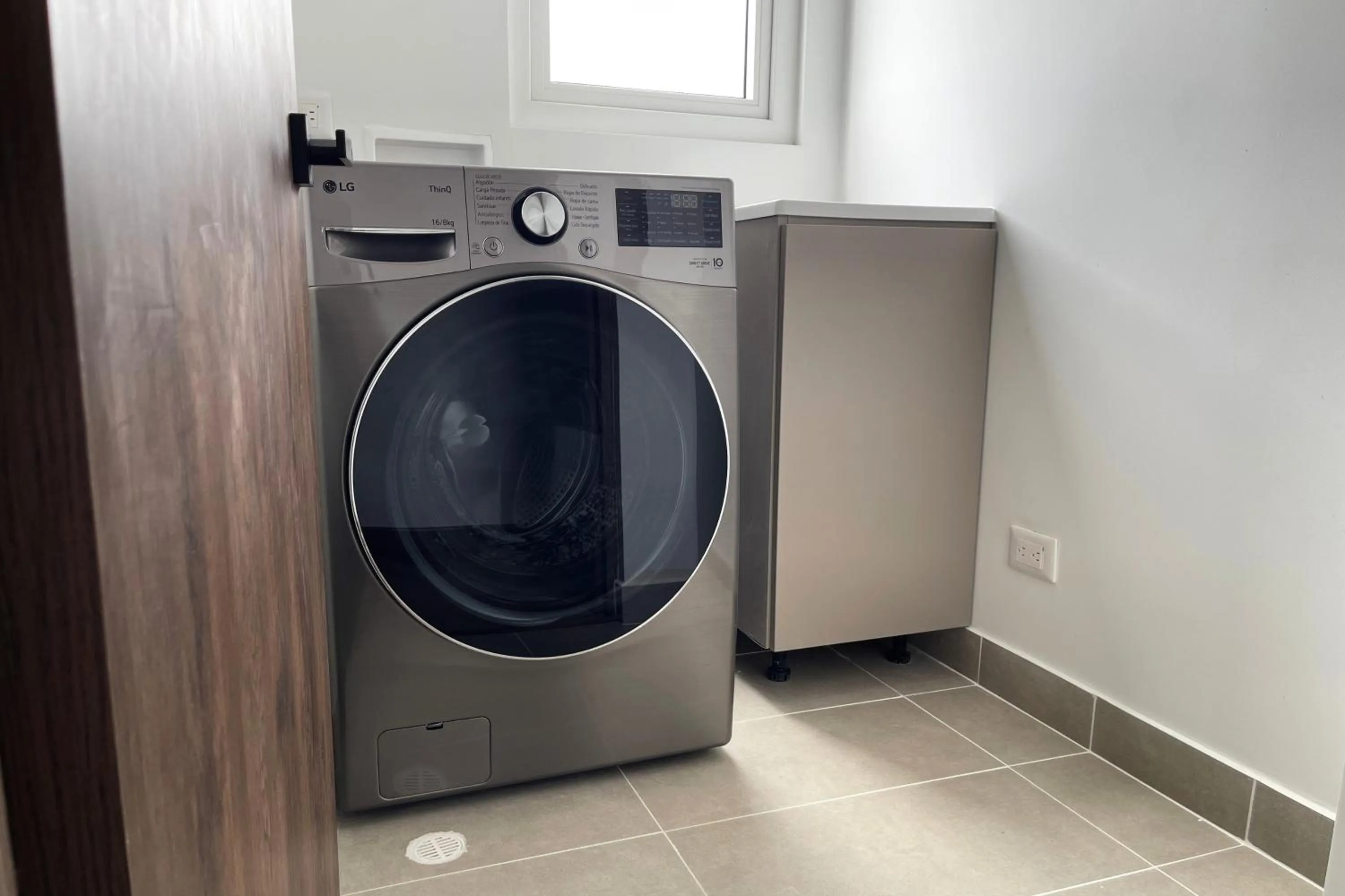 washing machine in VOU Suites by Avia Suites