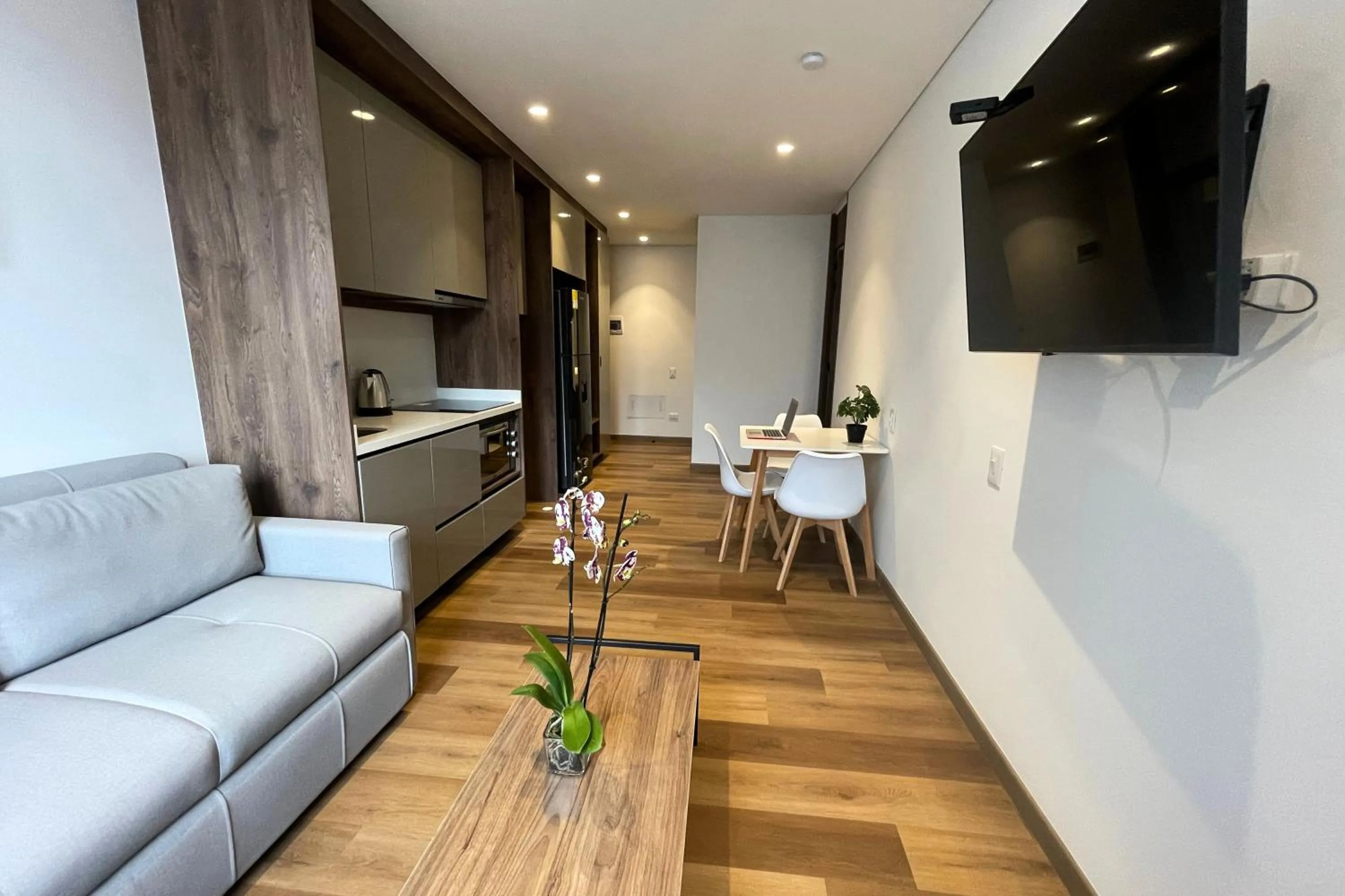 Kitchen or kitchenette in VOU Suites by Avia Suites