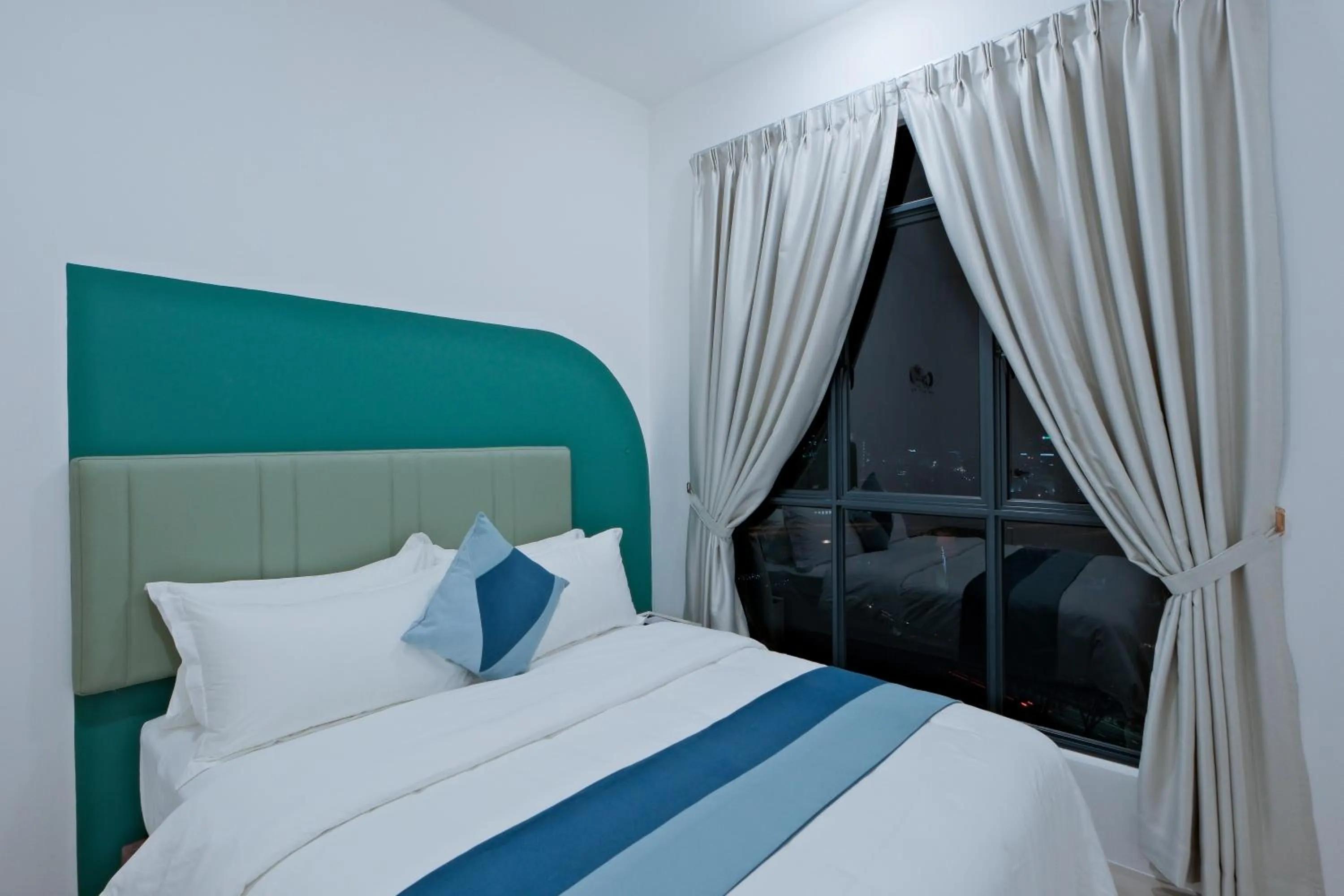 Bed in G Residence Sky Suite