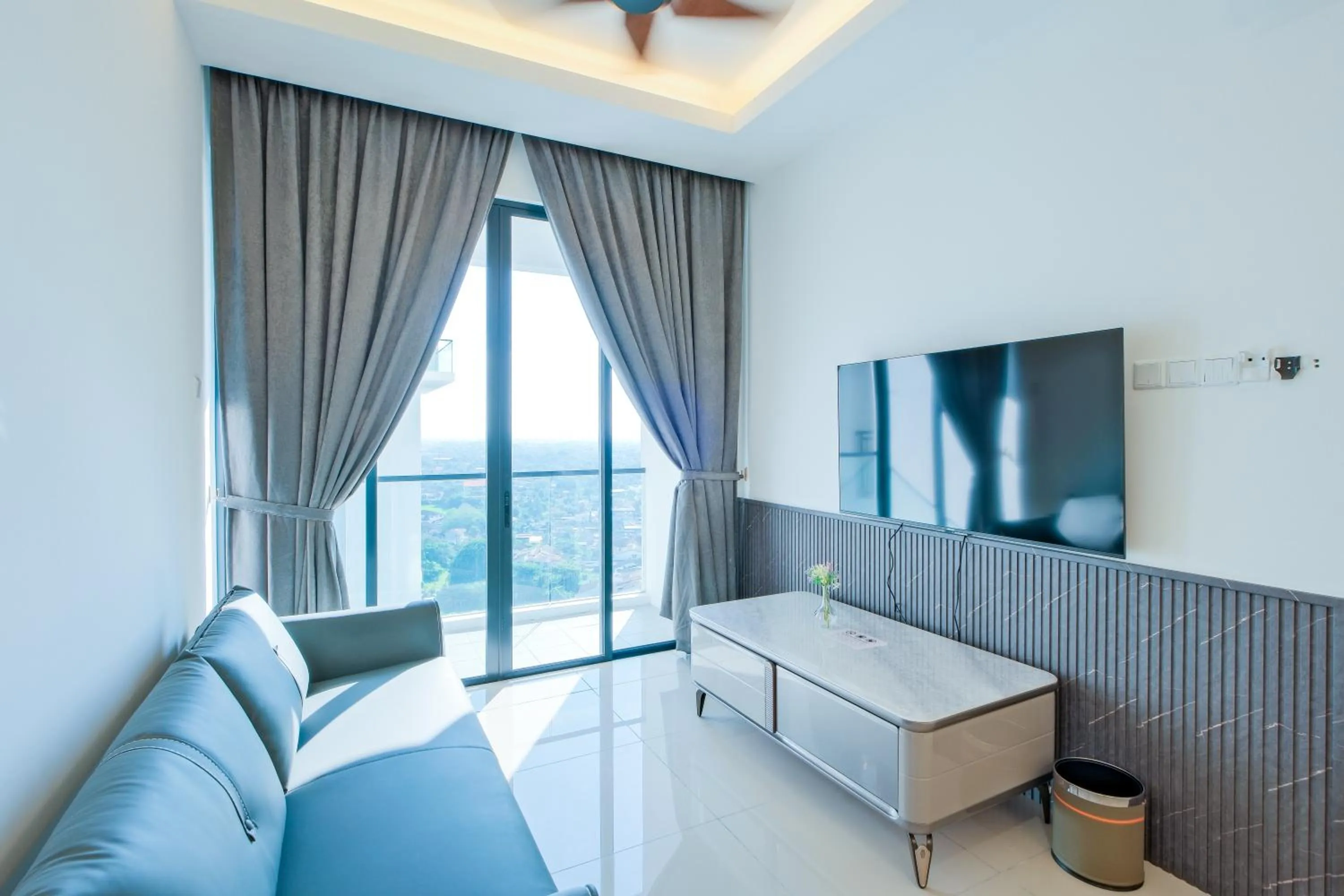 Communal lounge/ TV room in G Residence Sky Suite