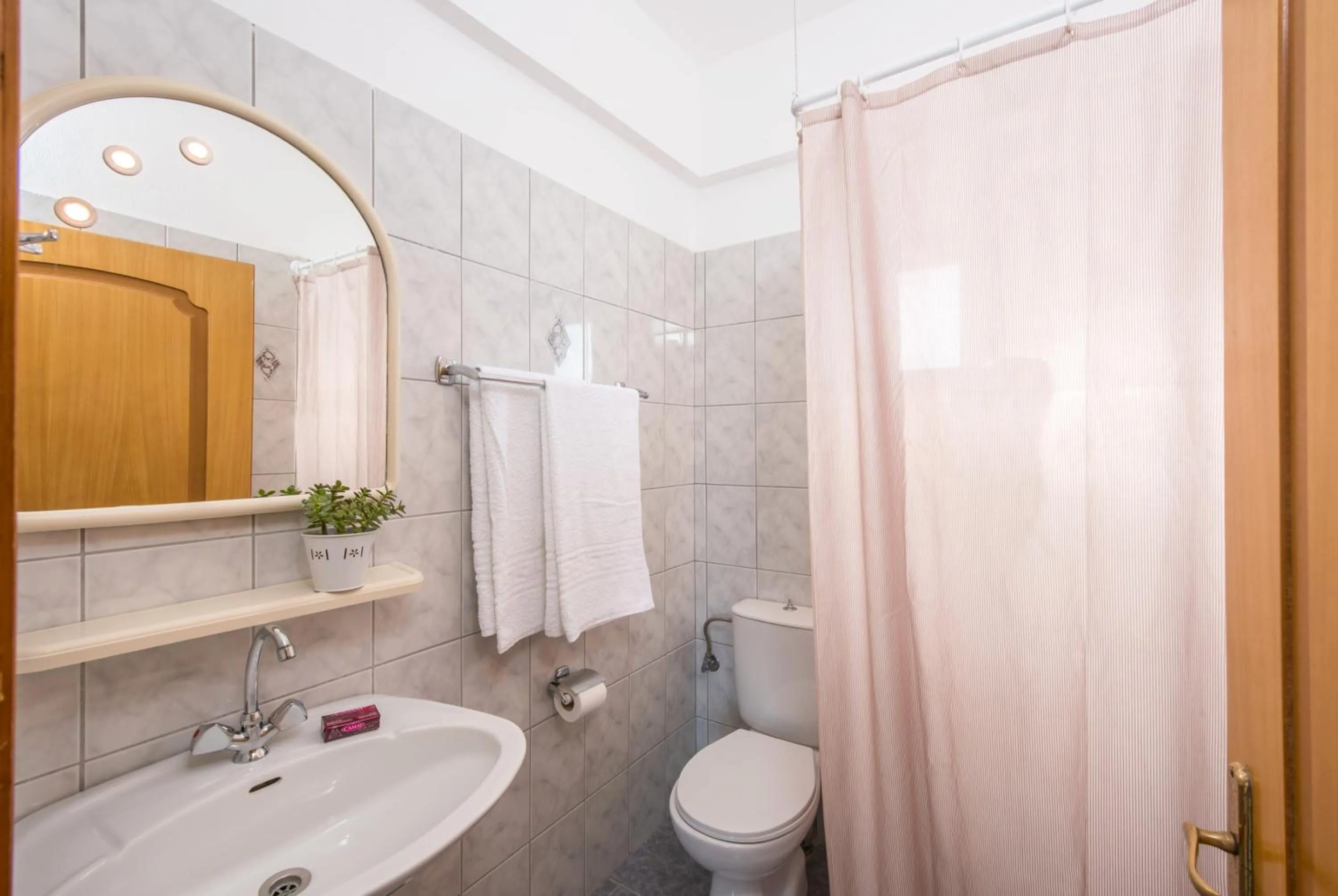 Bathroom in Elena's Beach Garden by Estia