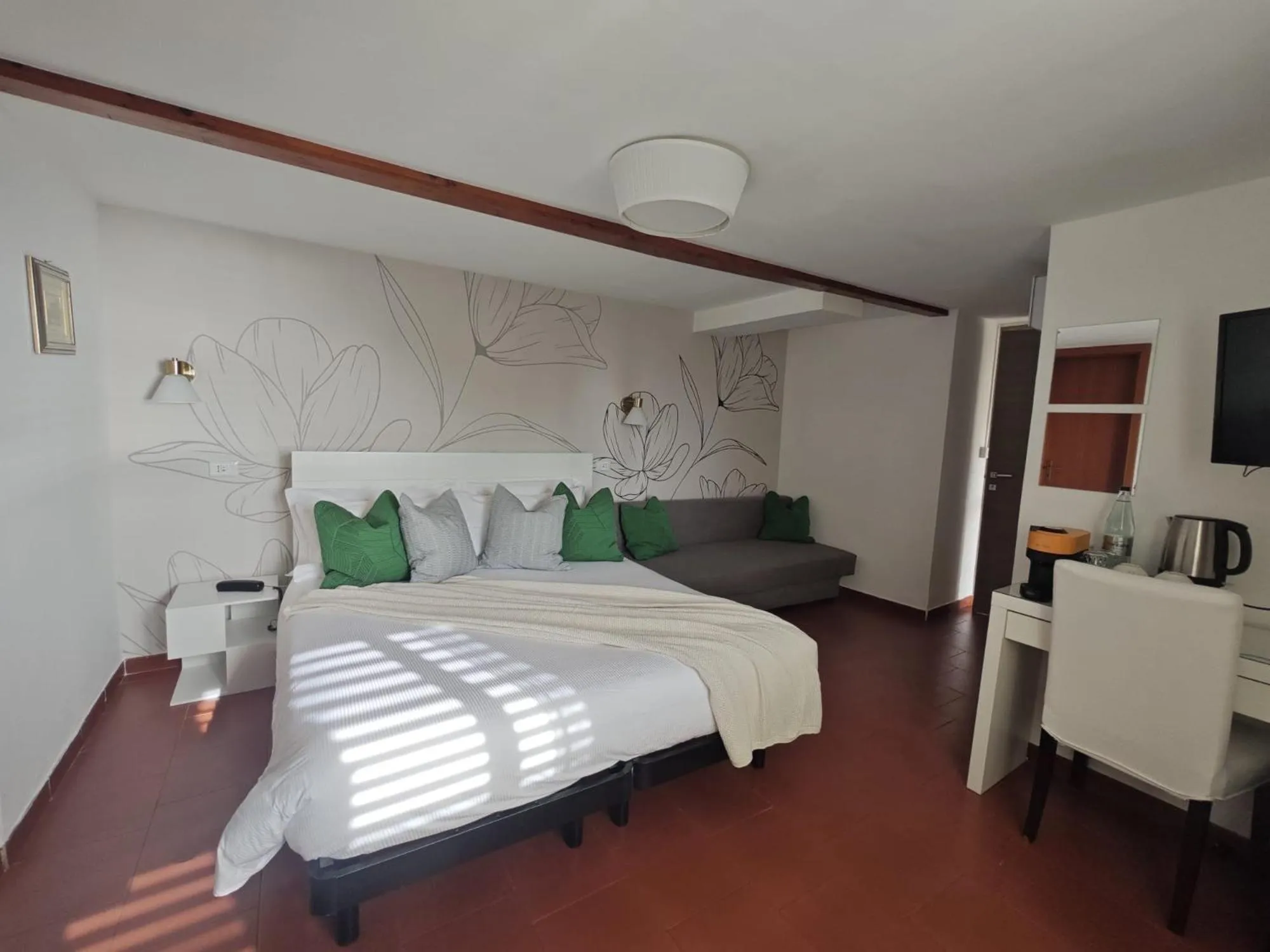 Bed in Villa Greta Hotel Rooms & Suites