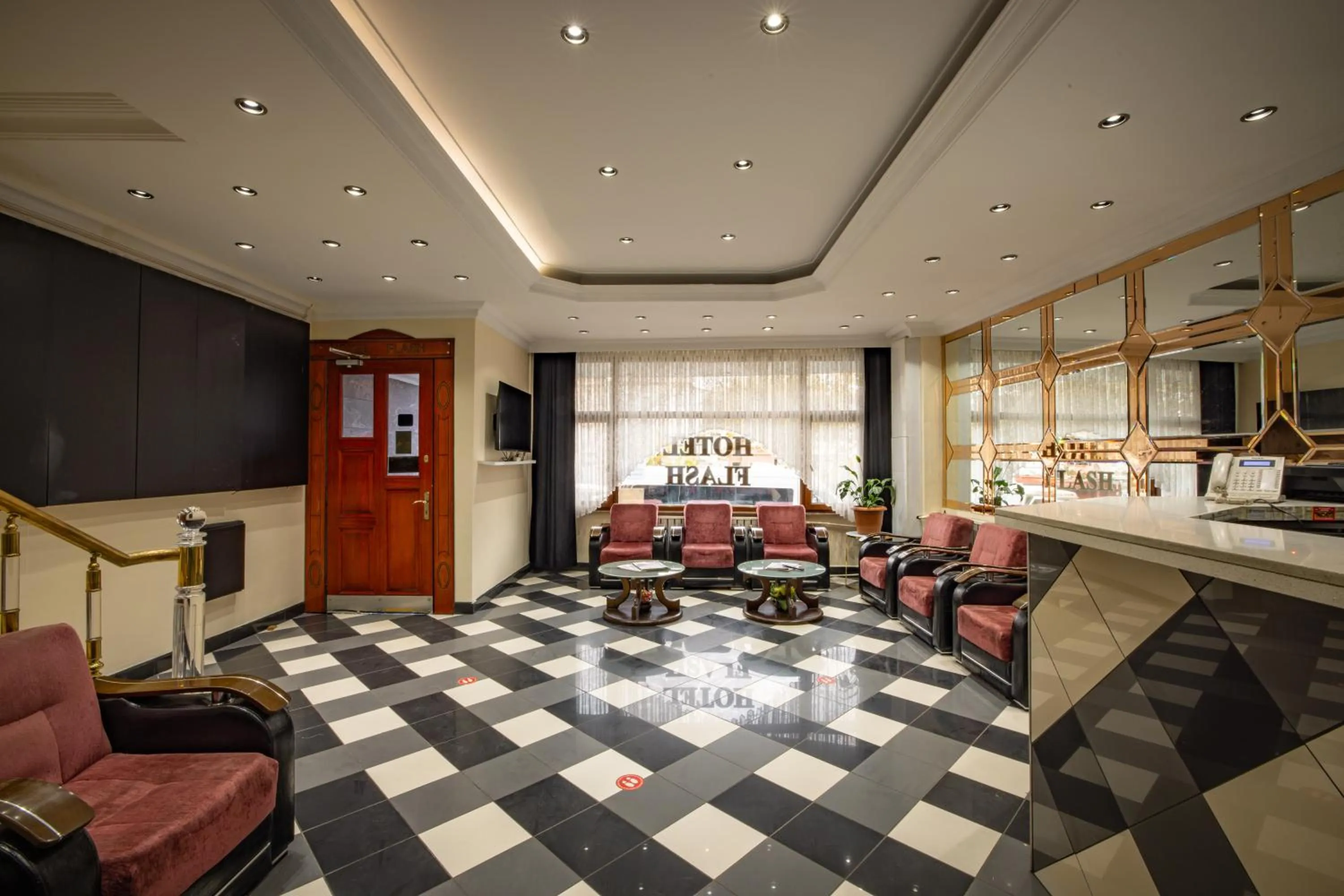 Communal lounge/ TV room in Hotel Flash