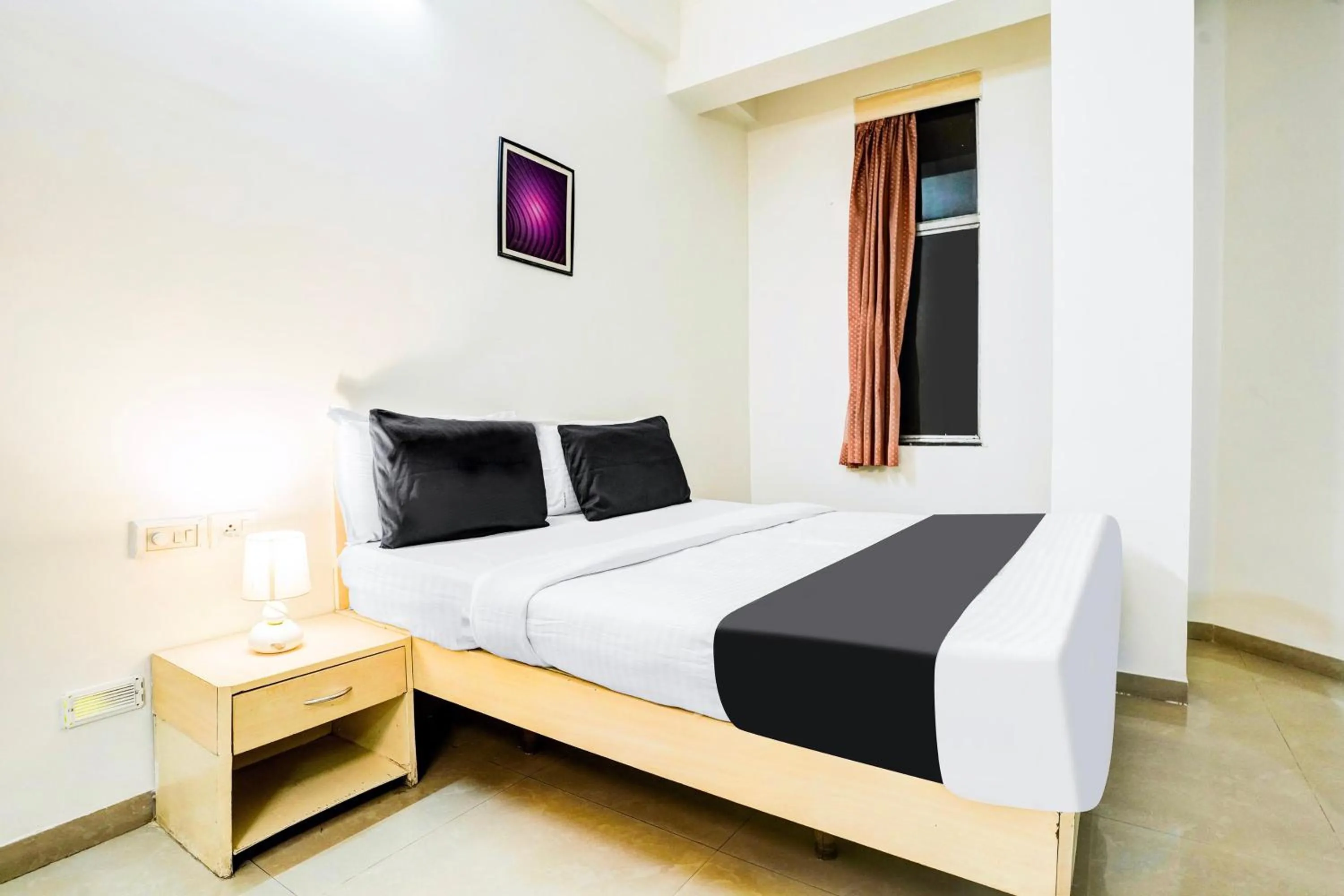Bedroom, Bed in Super Hotel O Nashik