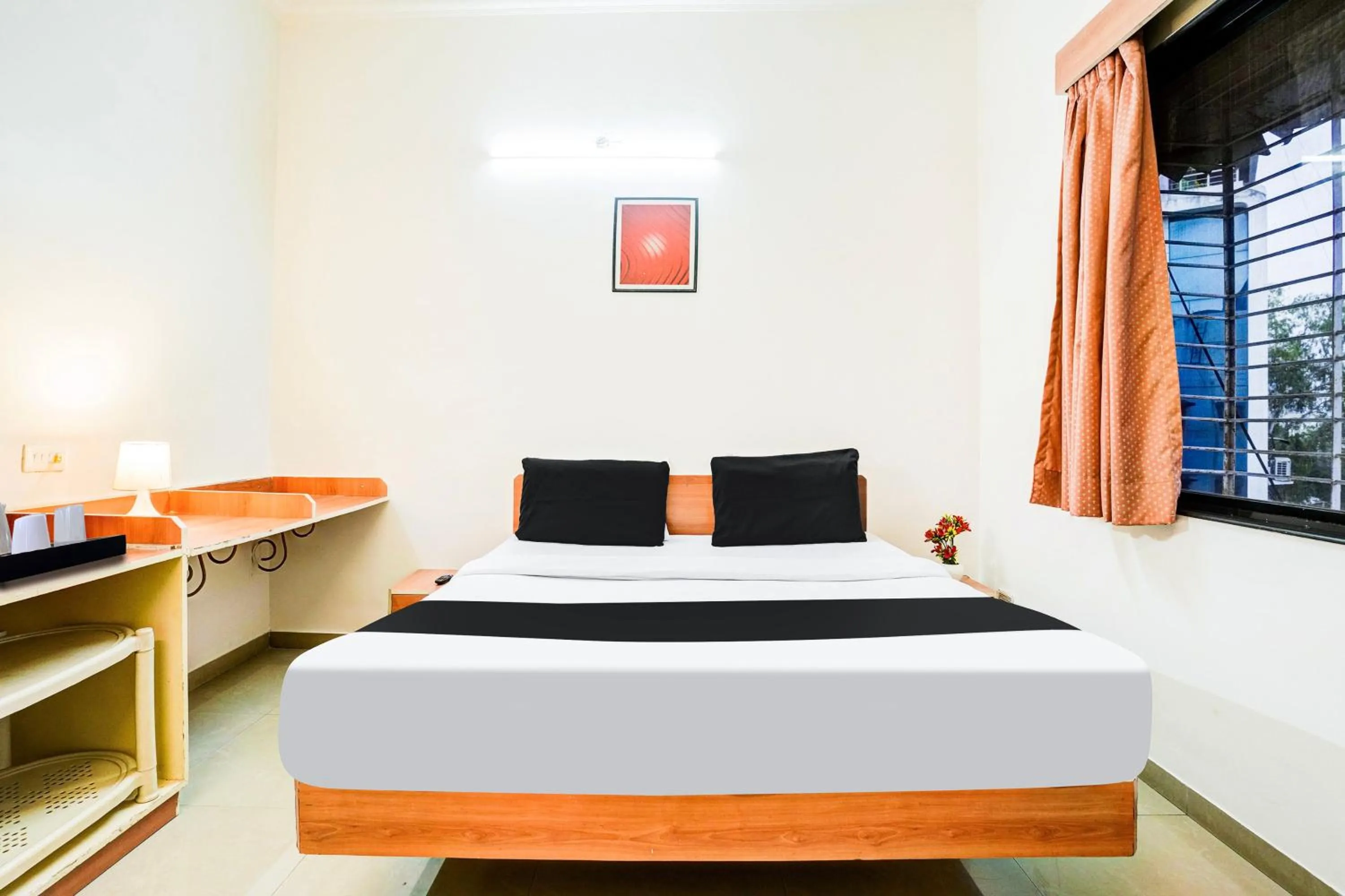 Bedroom, Bed in Super Hotel O Nashik