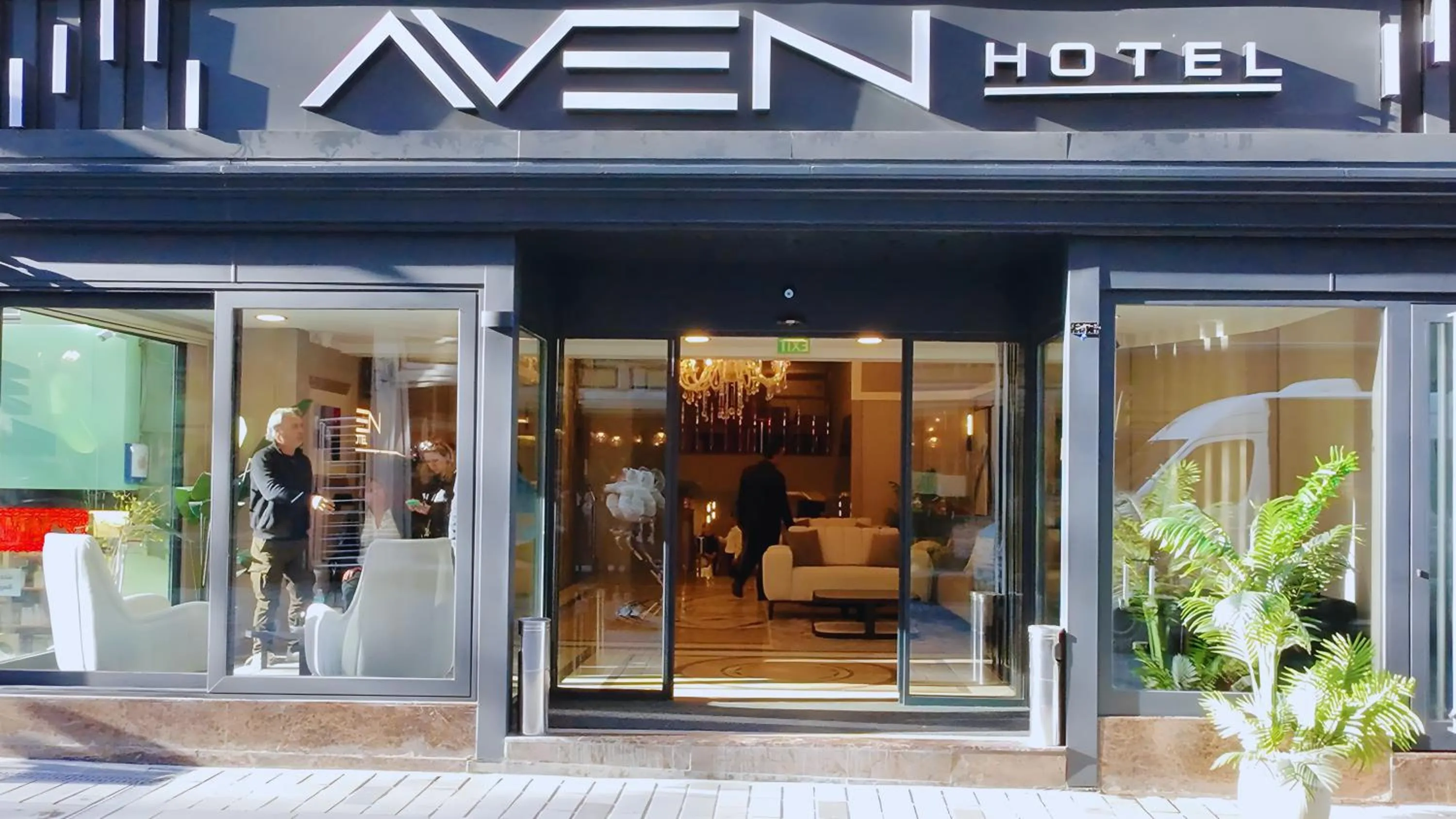 Property logo or sign in Aven Hotel