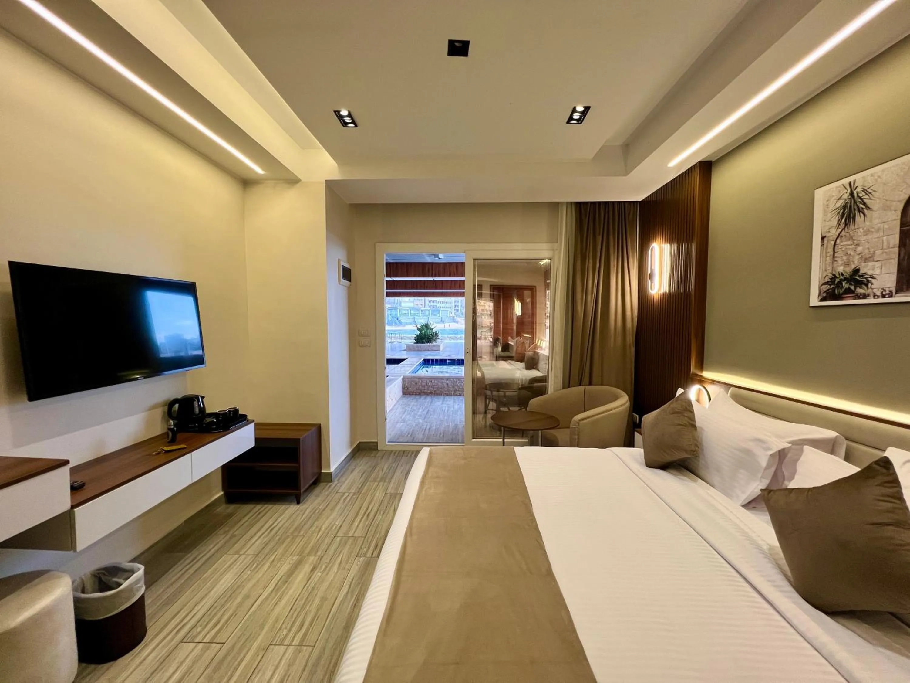 Photo of the whole room, Bed in XU San Stefano Hotel Alexandria