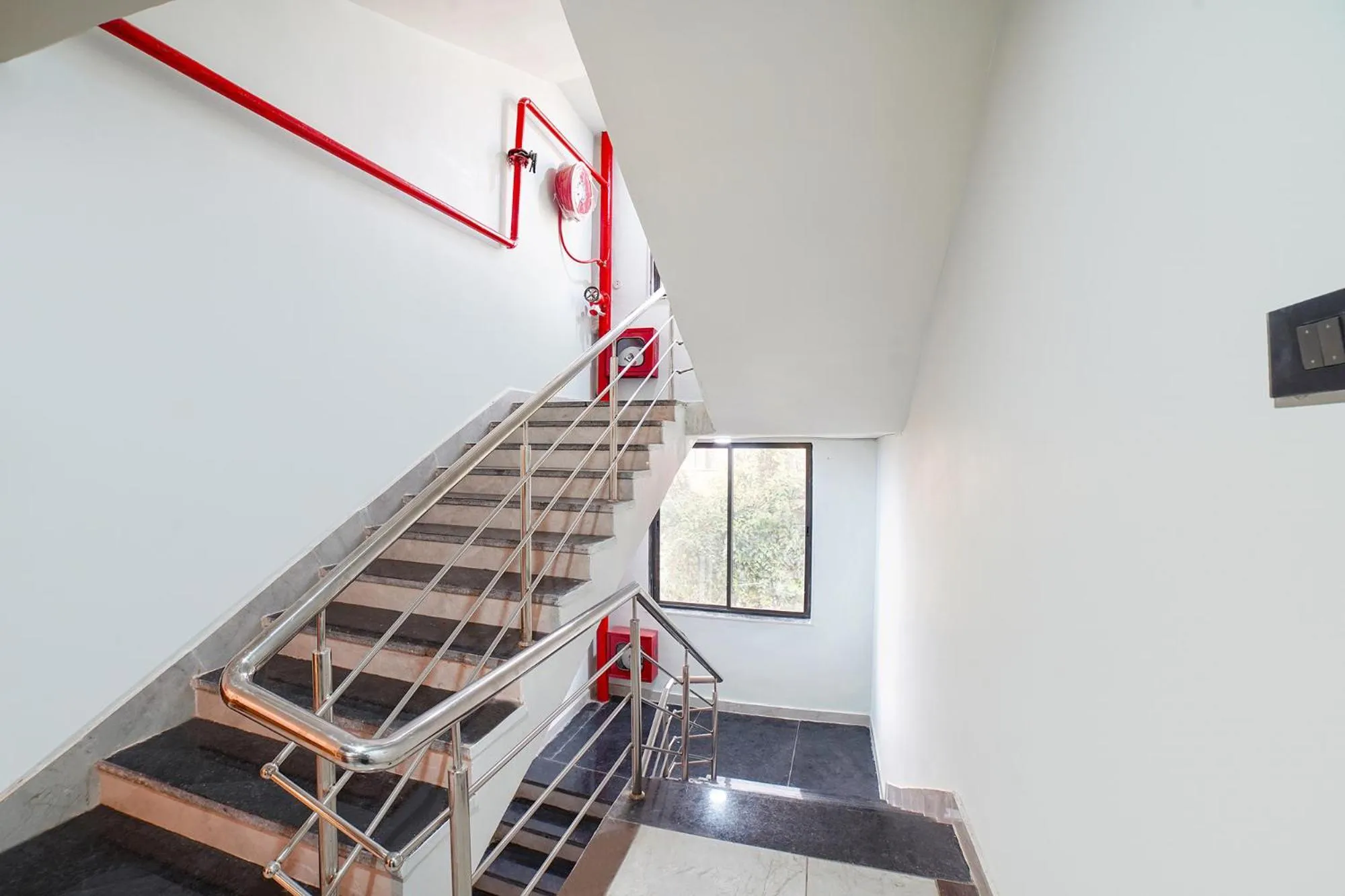 Lobby or reception in FabHotel Bliss Residency