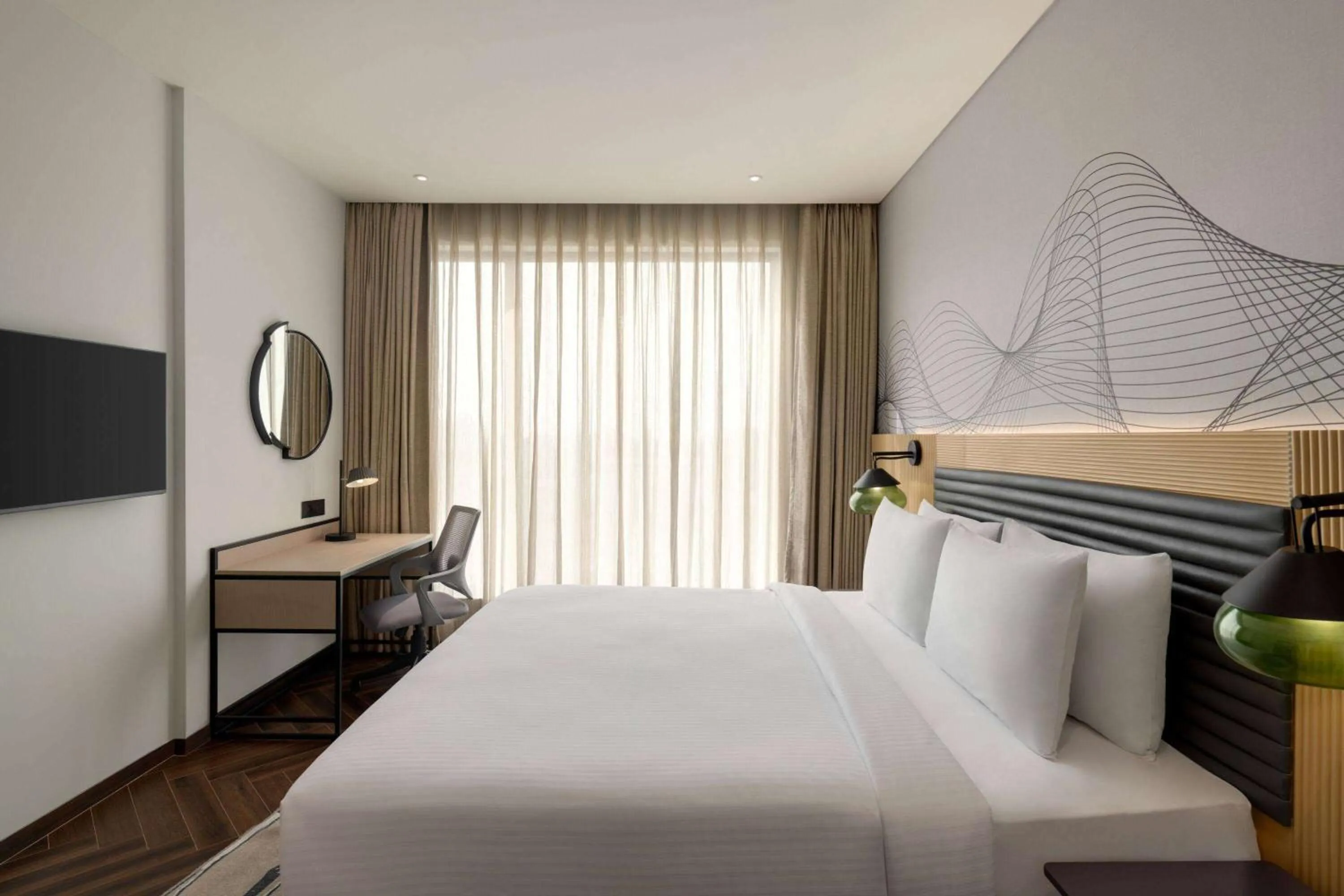 Photo of the whole room, Bed in Ramada Encore By Wyndham Bhiwadi Phool Bagh Chowk