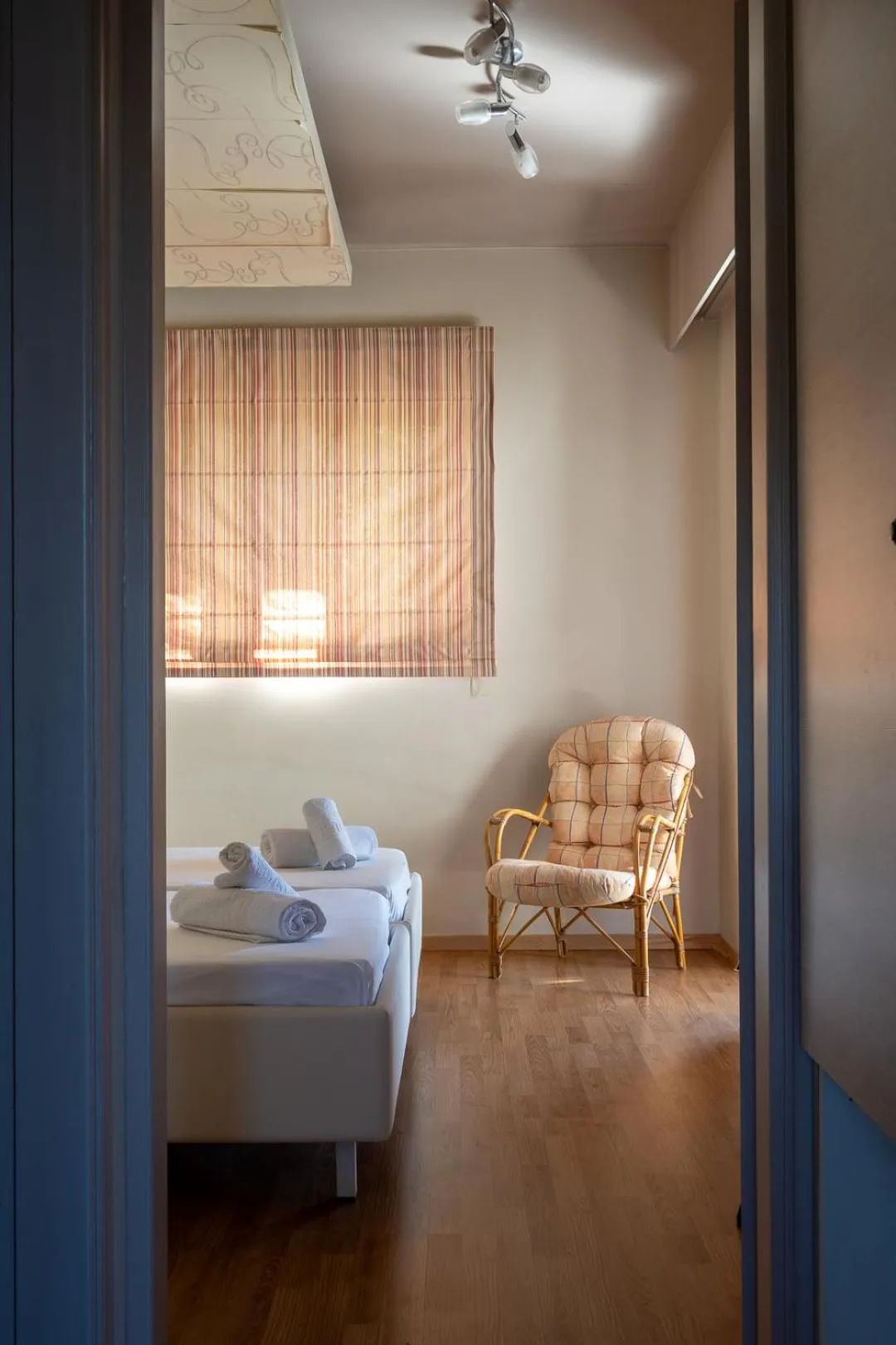 Bed in Triantafillas Suites