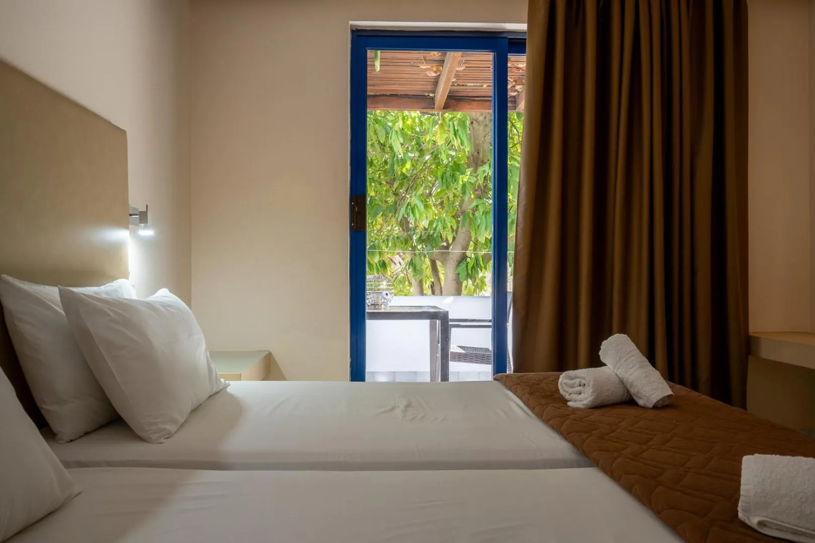 Bed in Triantafillas Suites