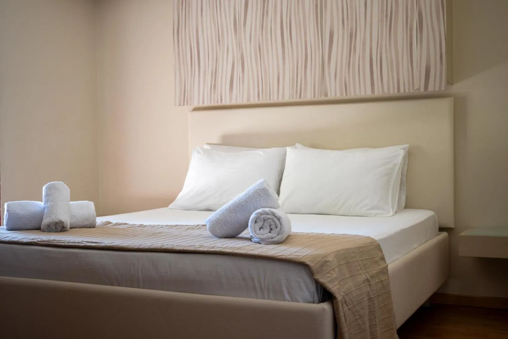 Bed in Triantafillas Suites