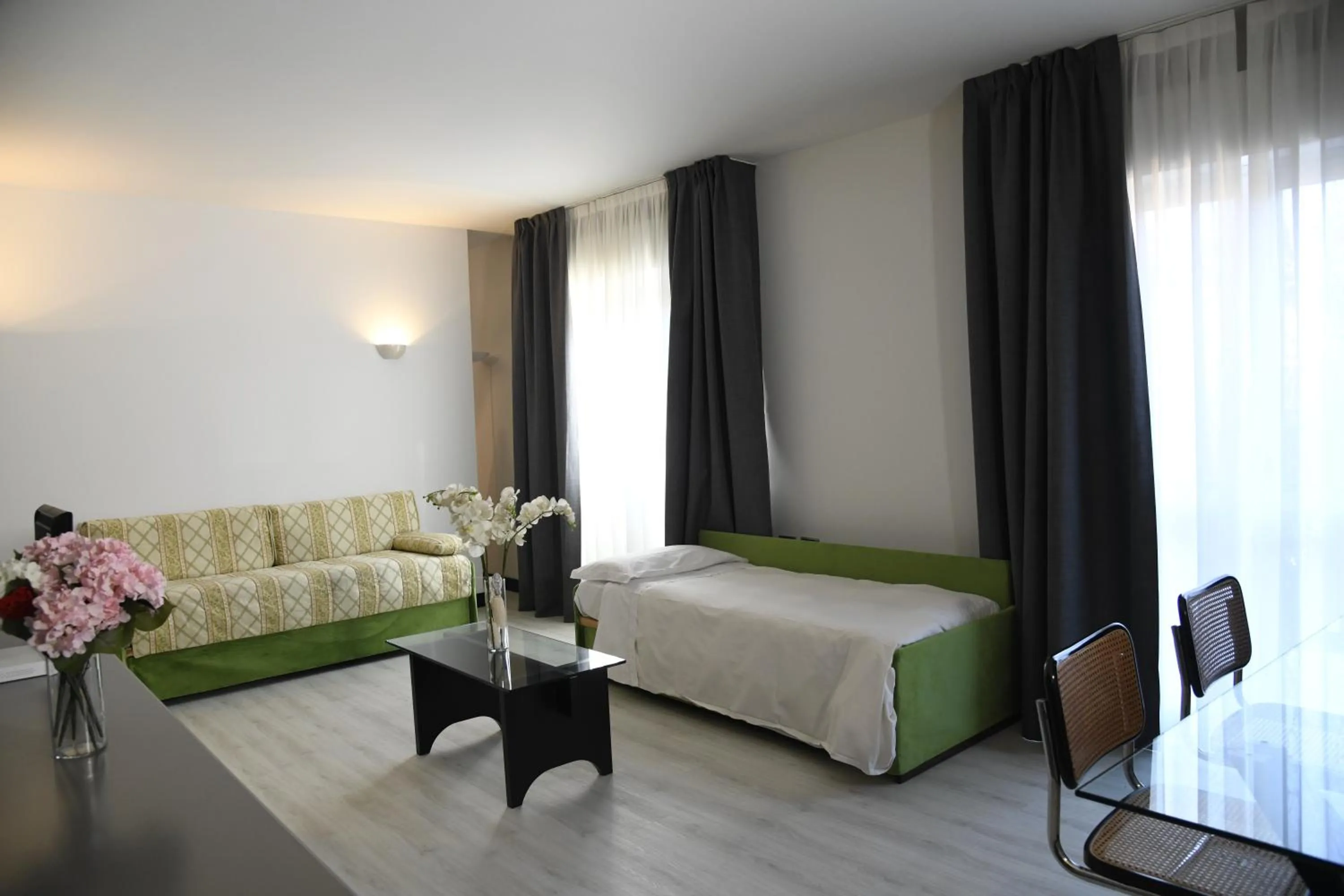 Bed in Brianteo Hotel Residence and Restaurant