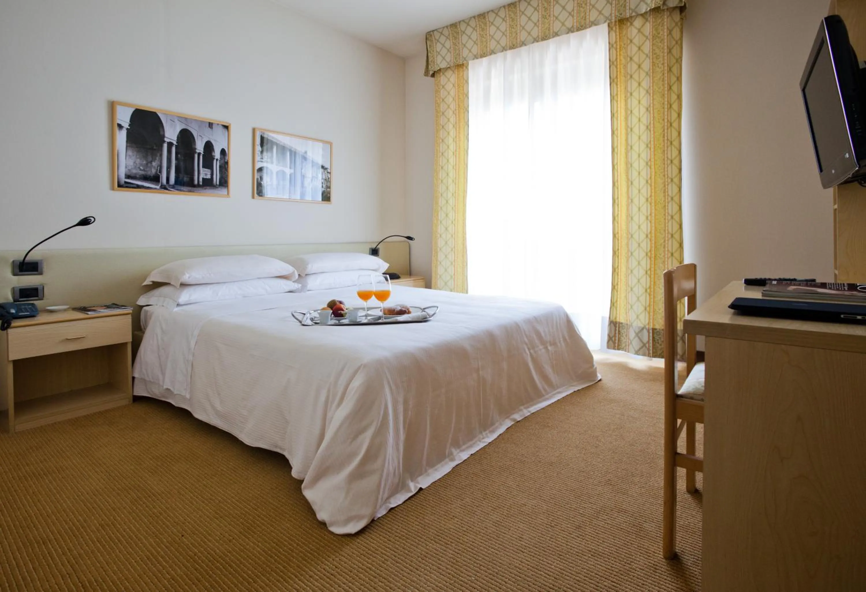 Bed in Brianteo Hotel Residence and Restaurant