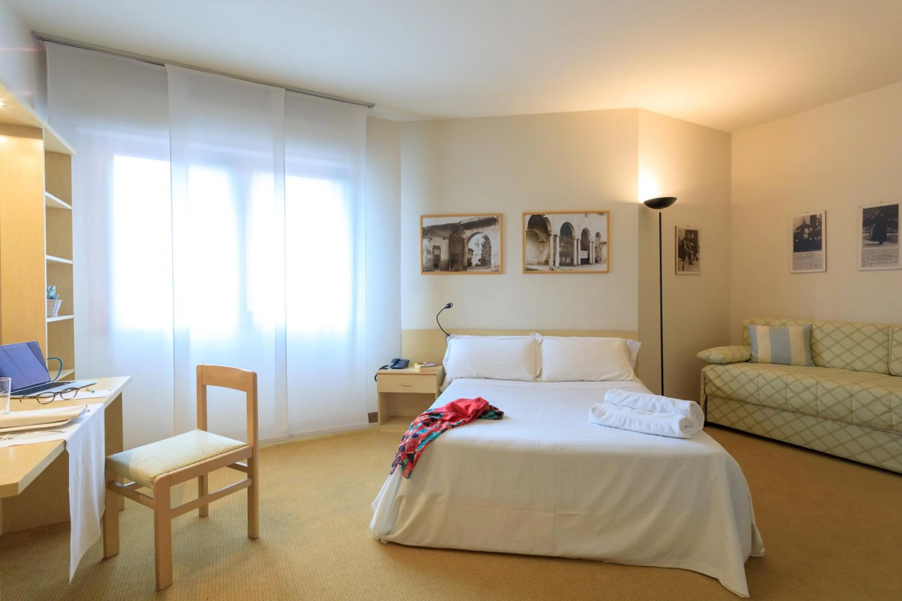 Bed in Brianteo Hotel Residence and Restaurant