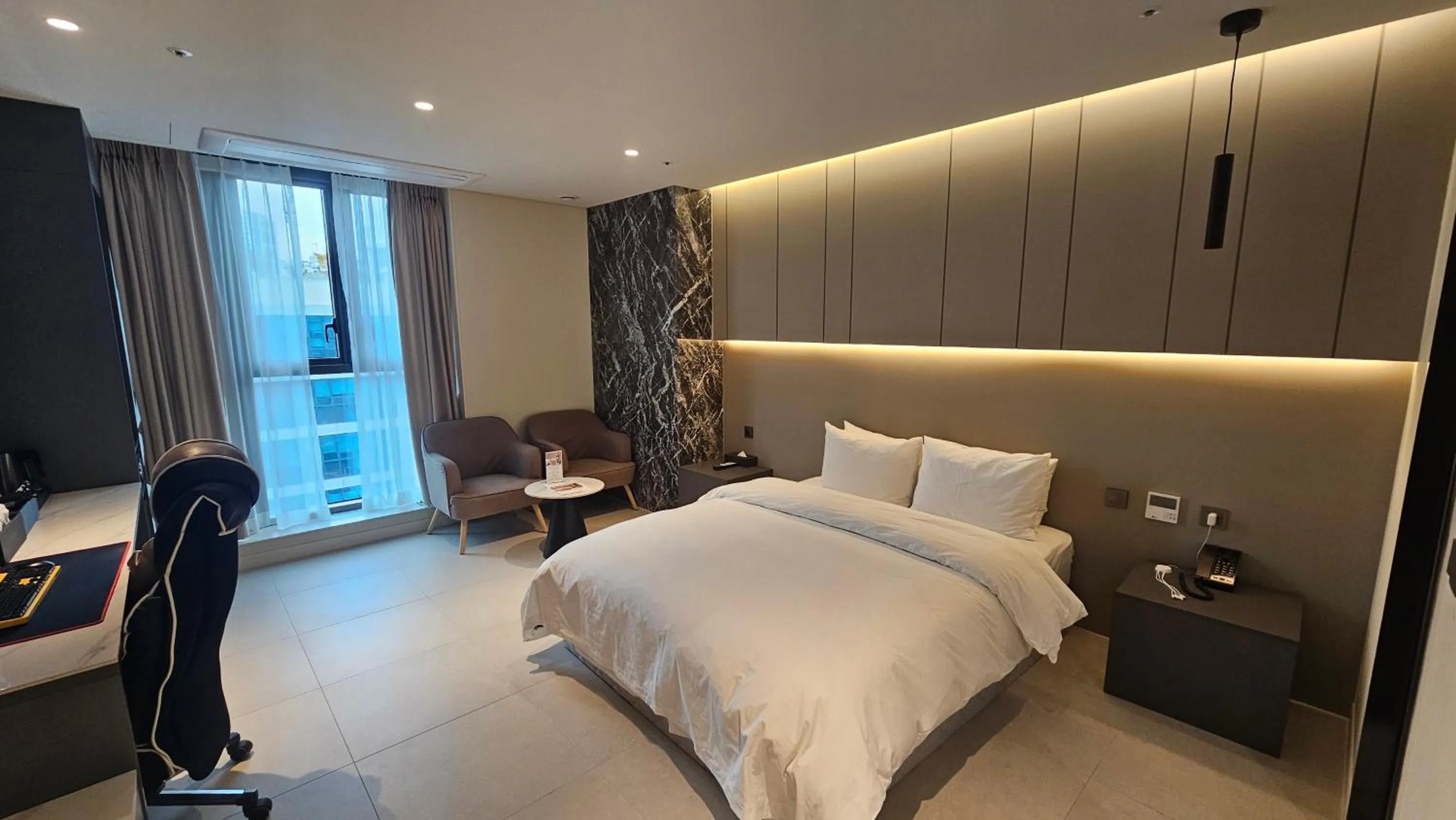 Bedroom in The Gleam Hotel