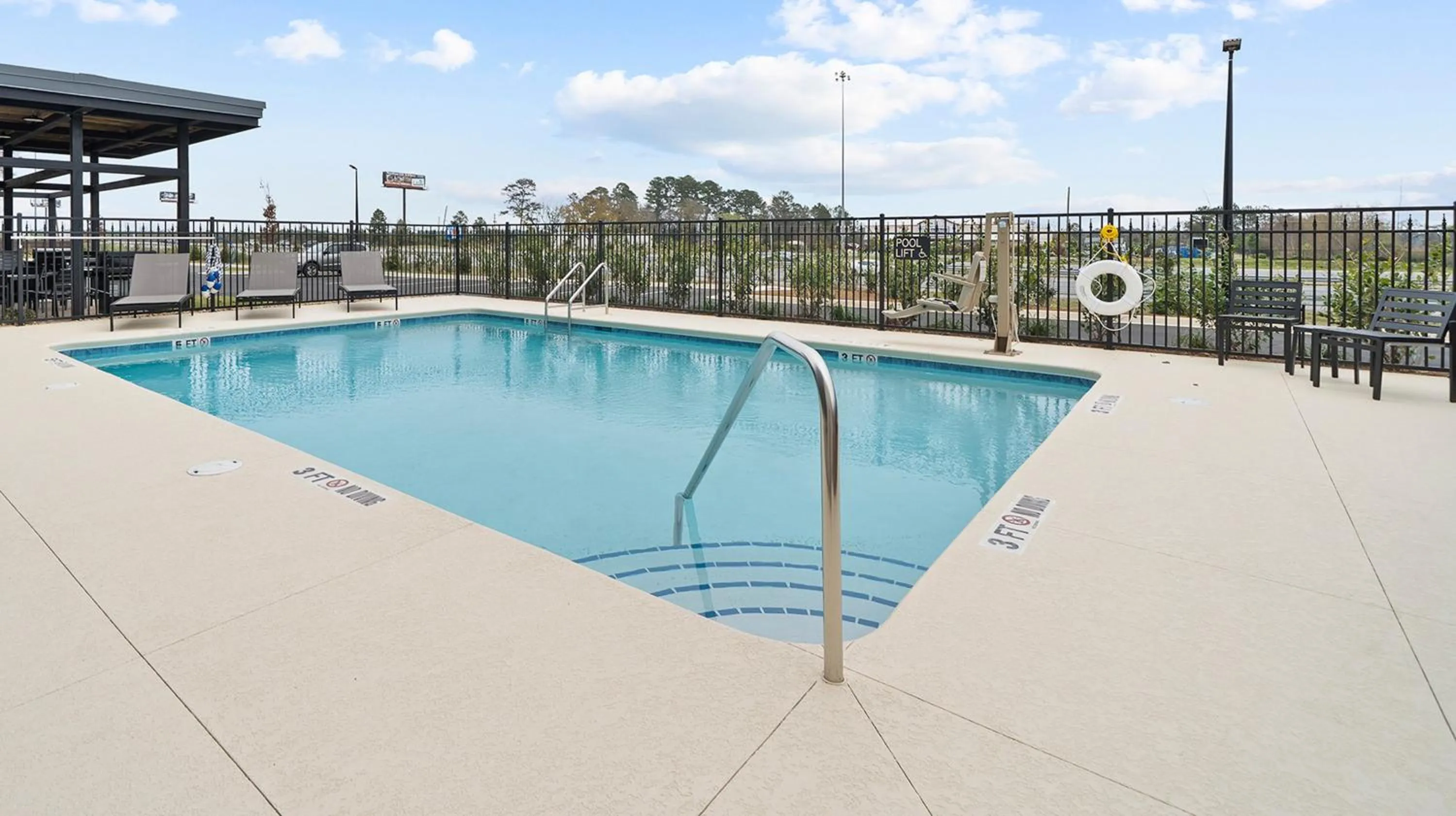 Swimming pool in Candlewood Suites Perry-National Fairground Area by IHG