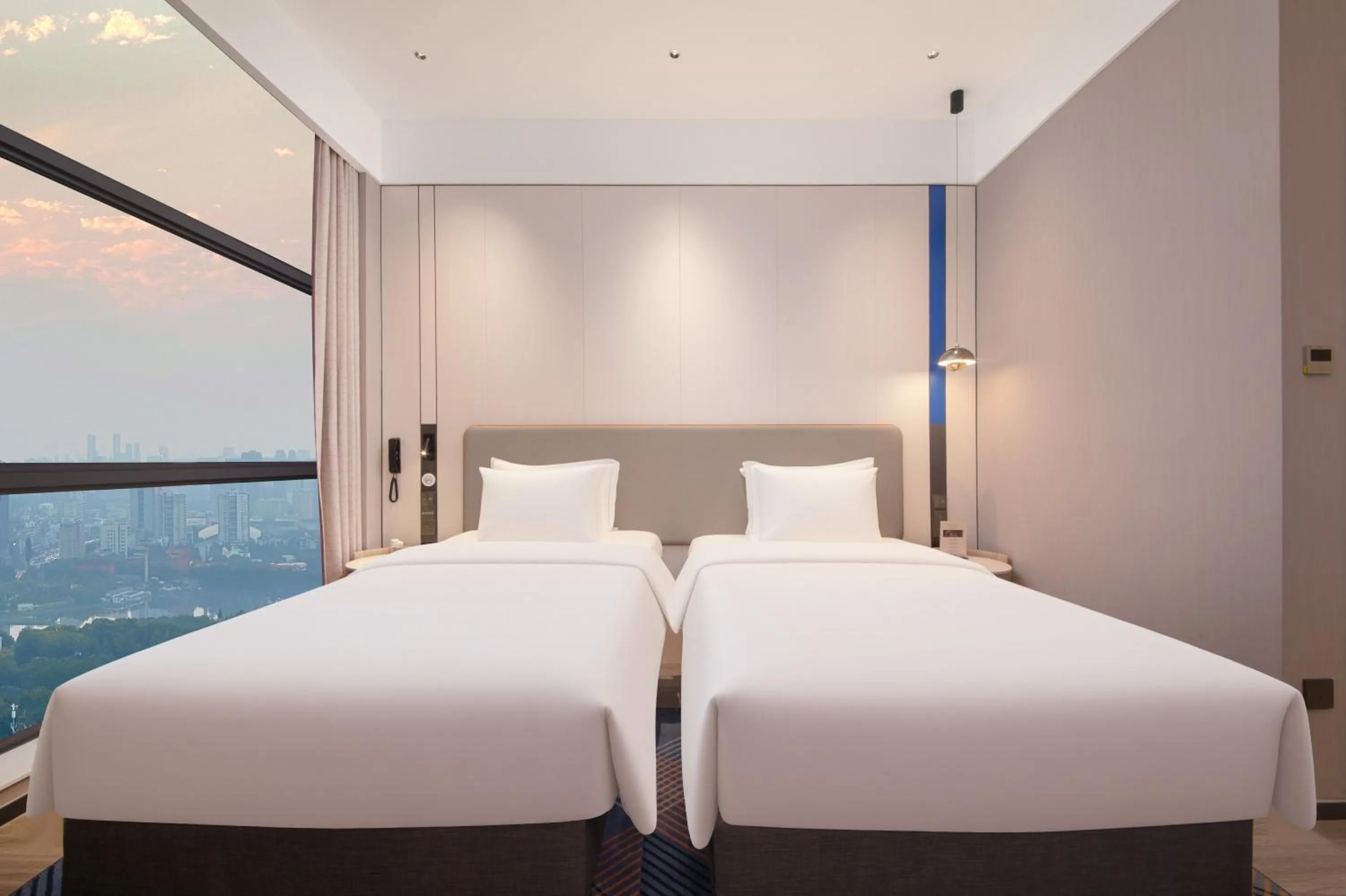 Bed in Holiday Inn Express Wuhan East Lake by IHG