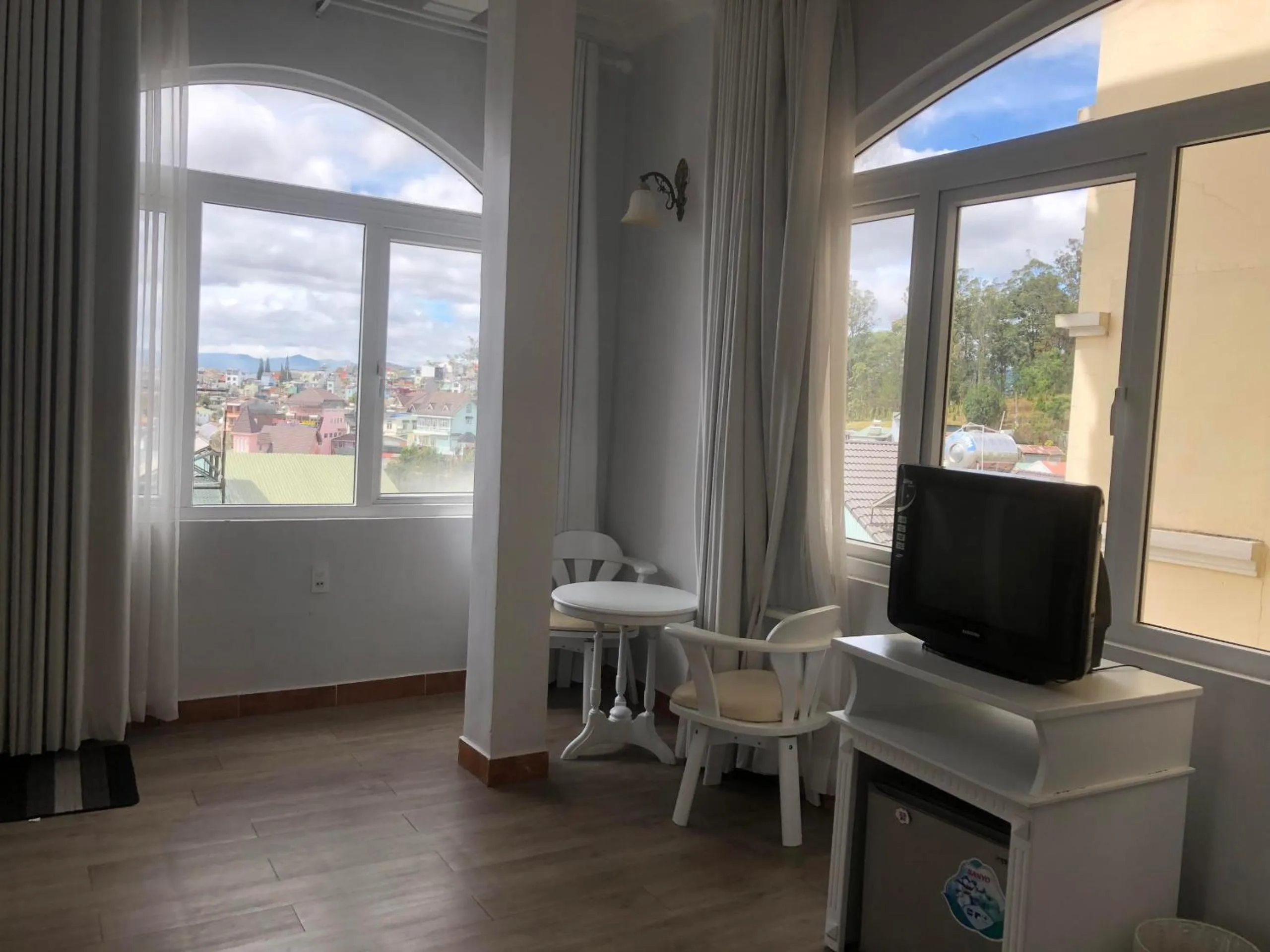 Bedroom in Le Petit Paris Dalat Hotel