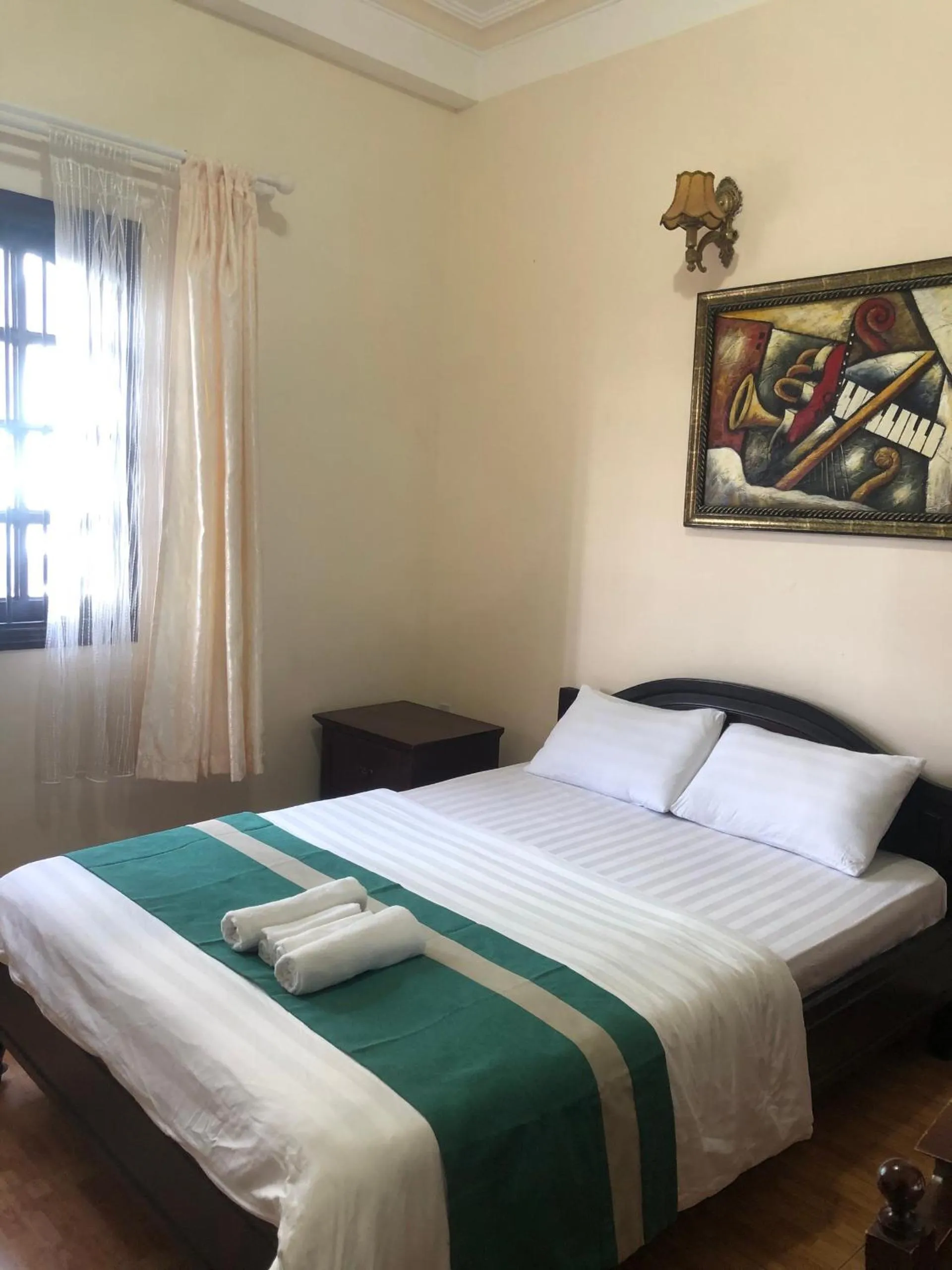 Bedroom, Bed in Le Petit Paris Dalat Hotel