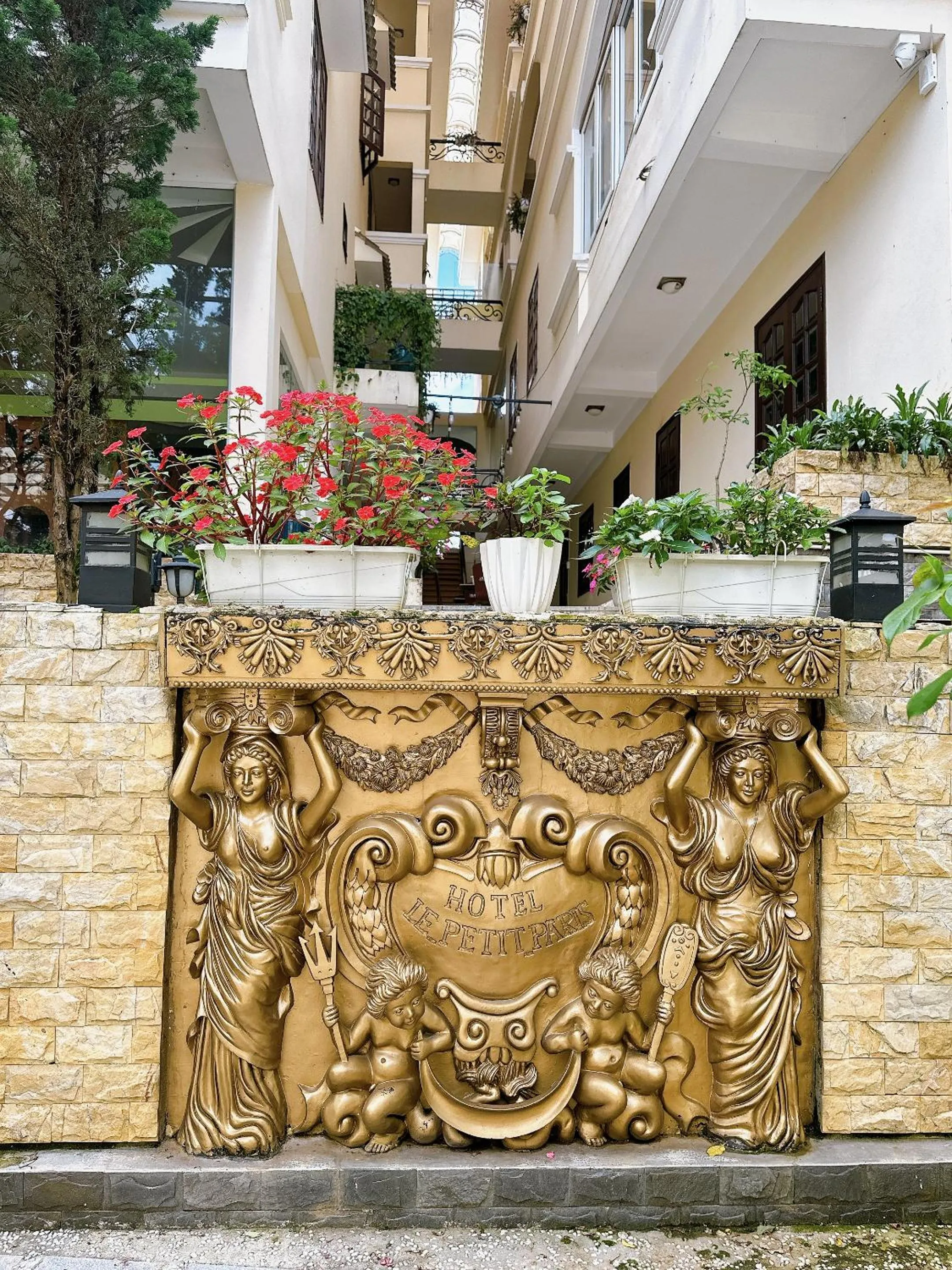 Property logo or sign in Le Petit Paris Dalat Hotel