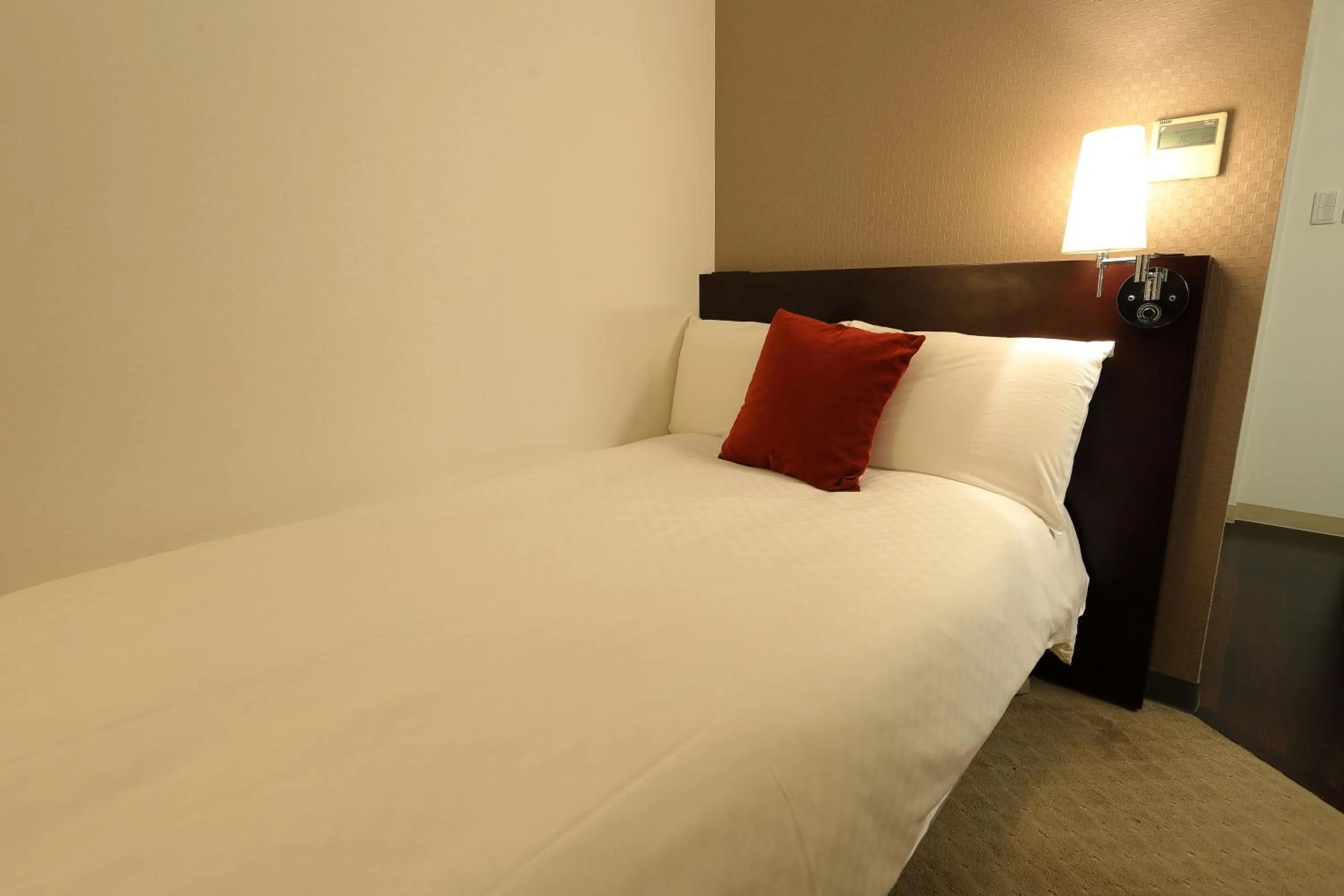 Bed in Hotel Massimo Mishima