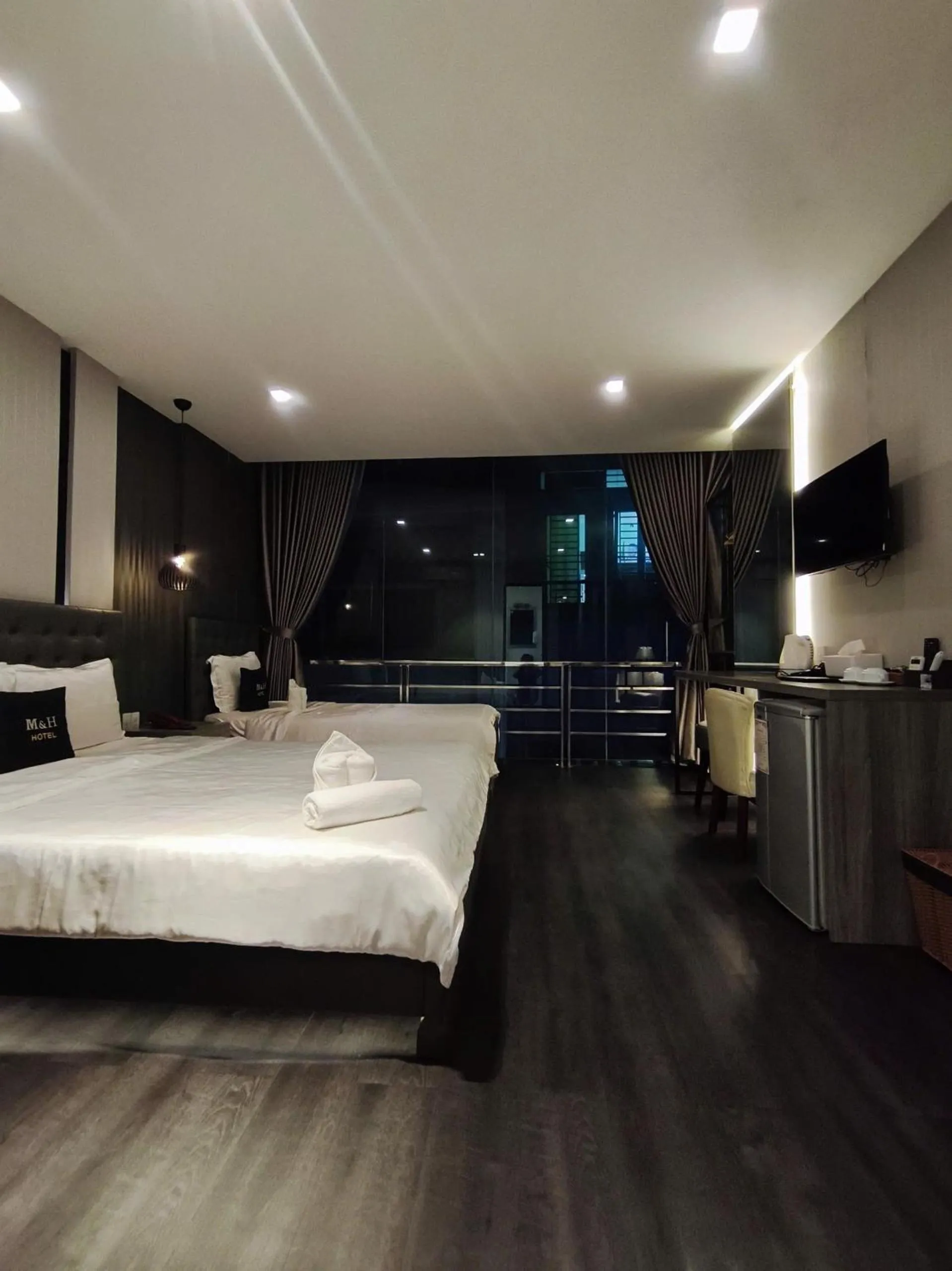 Photo of the whole room, Bed in M&H Hotel