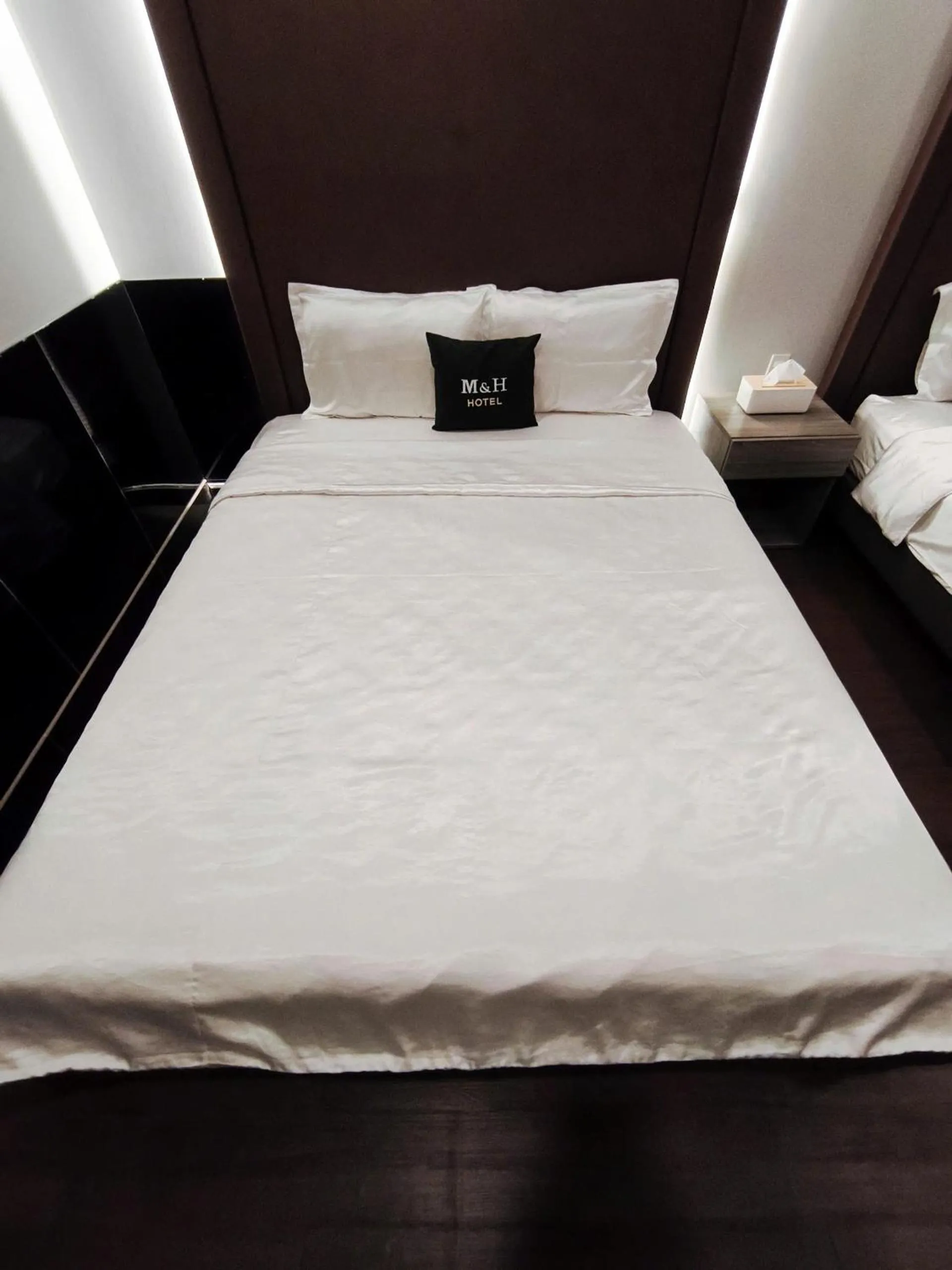 Bed in M&H Hotel