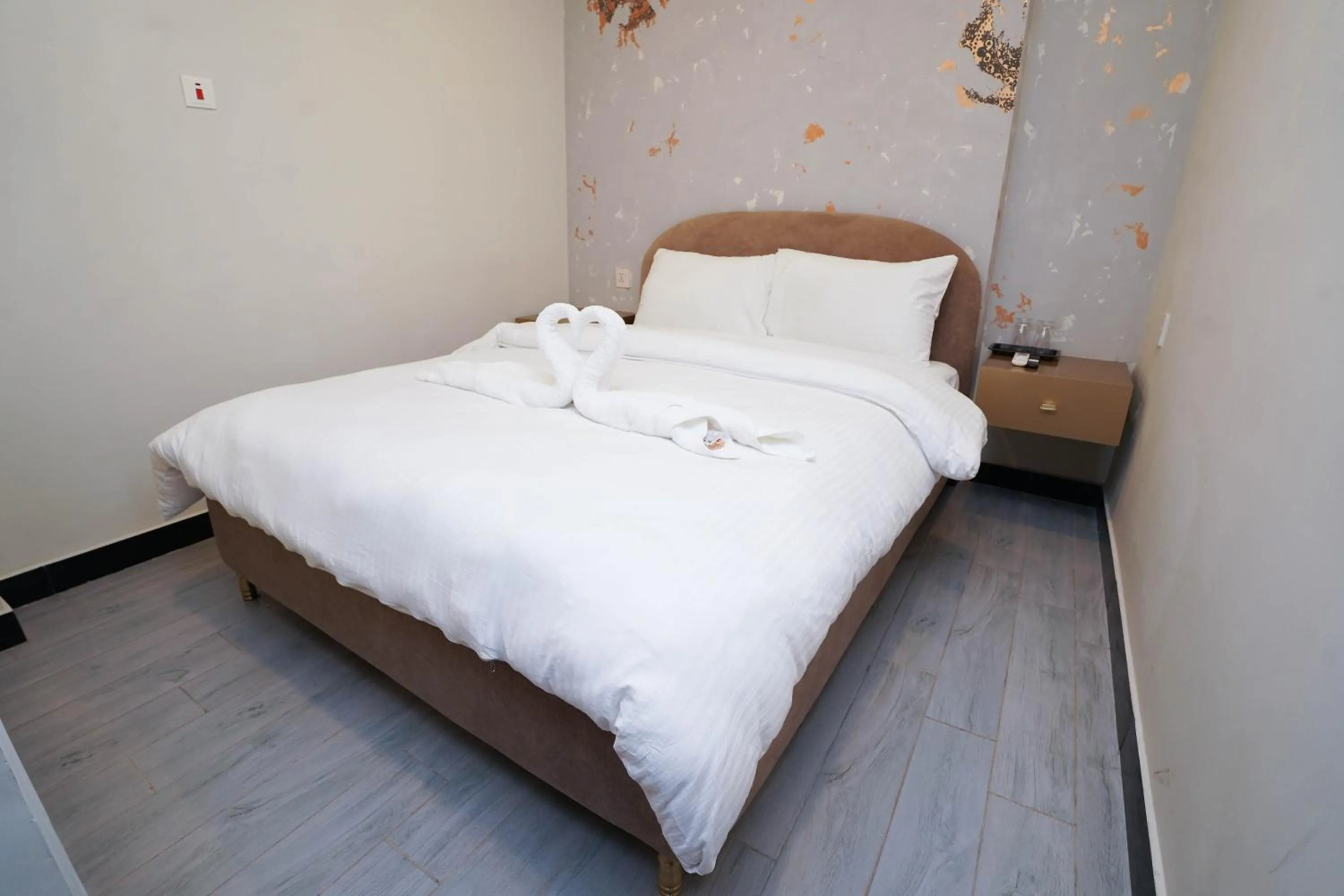 Bed in Luxvill Hotel