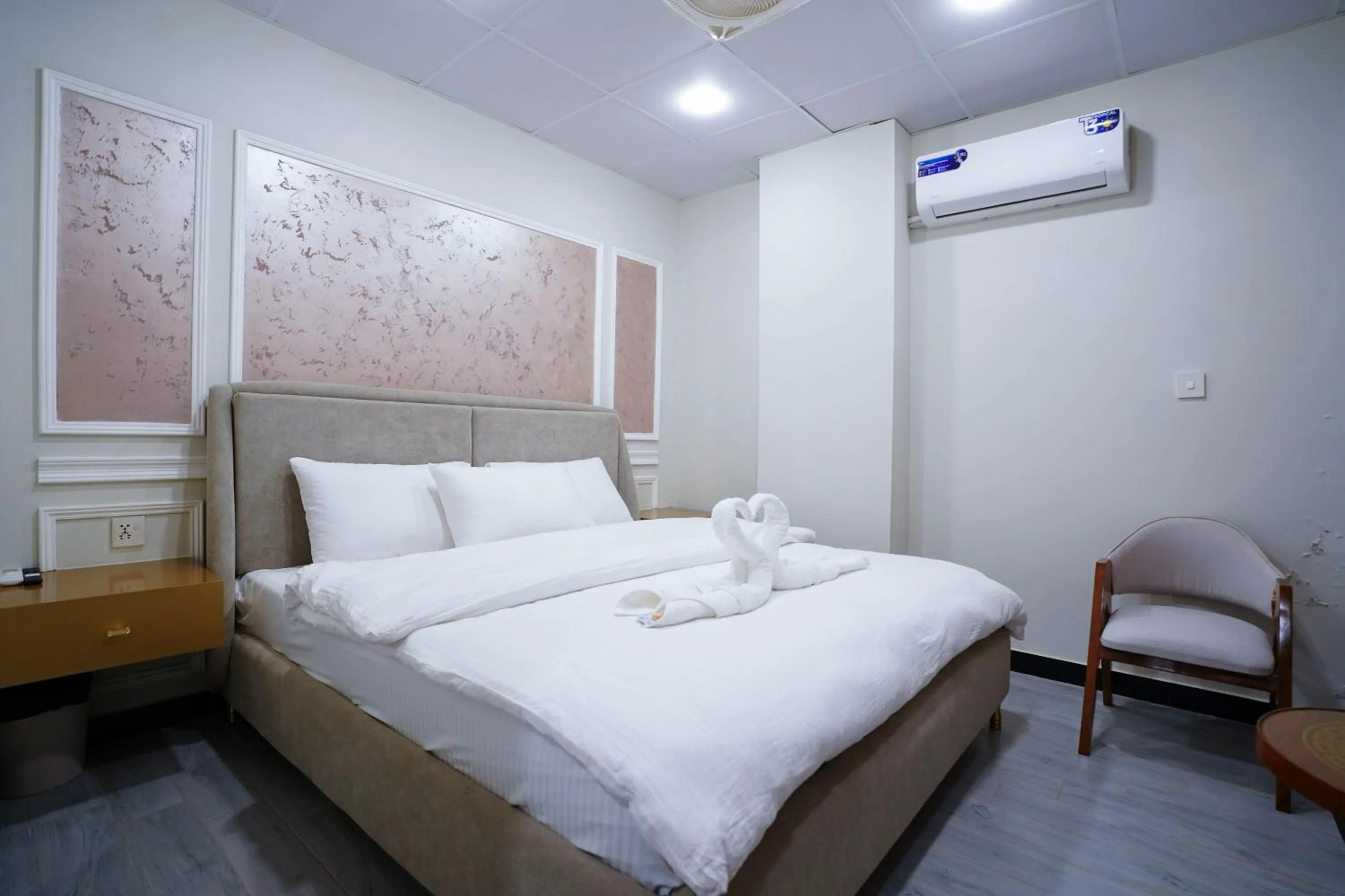 Bed in Luxvill Hotel