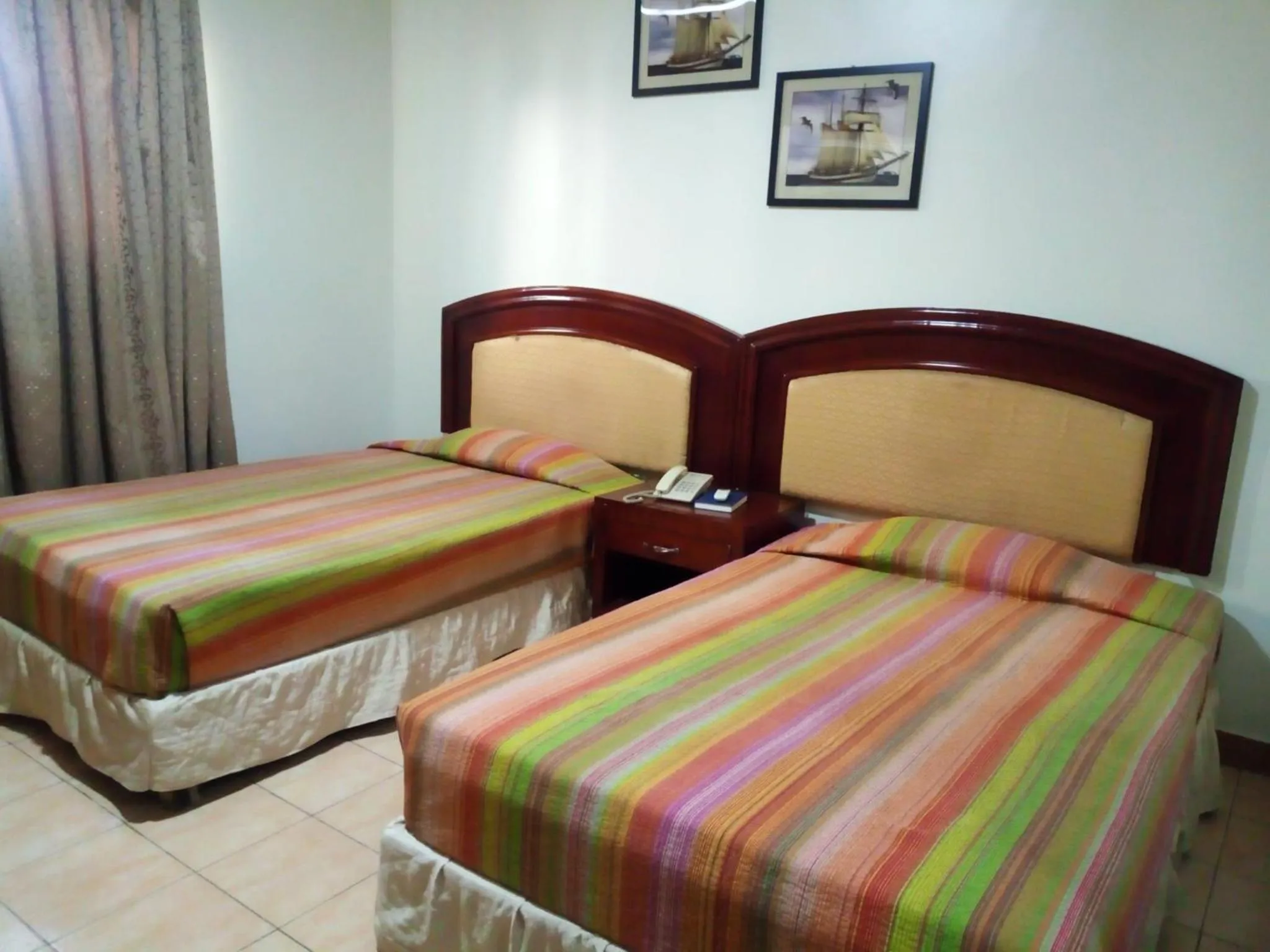 Bed in Emerald Hotel Kampala