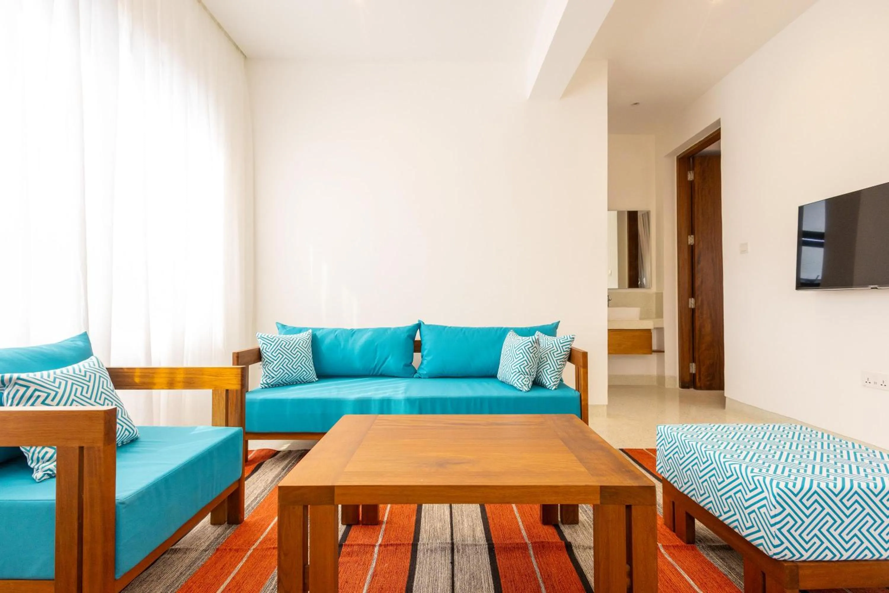 Communal lounge/ TV room in Amkia Villas Diani