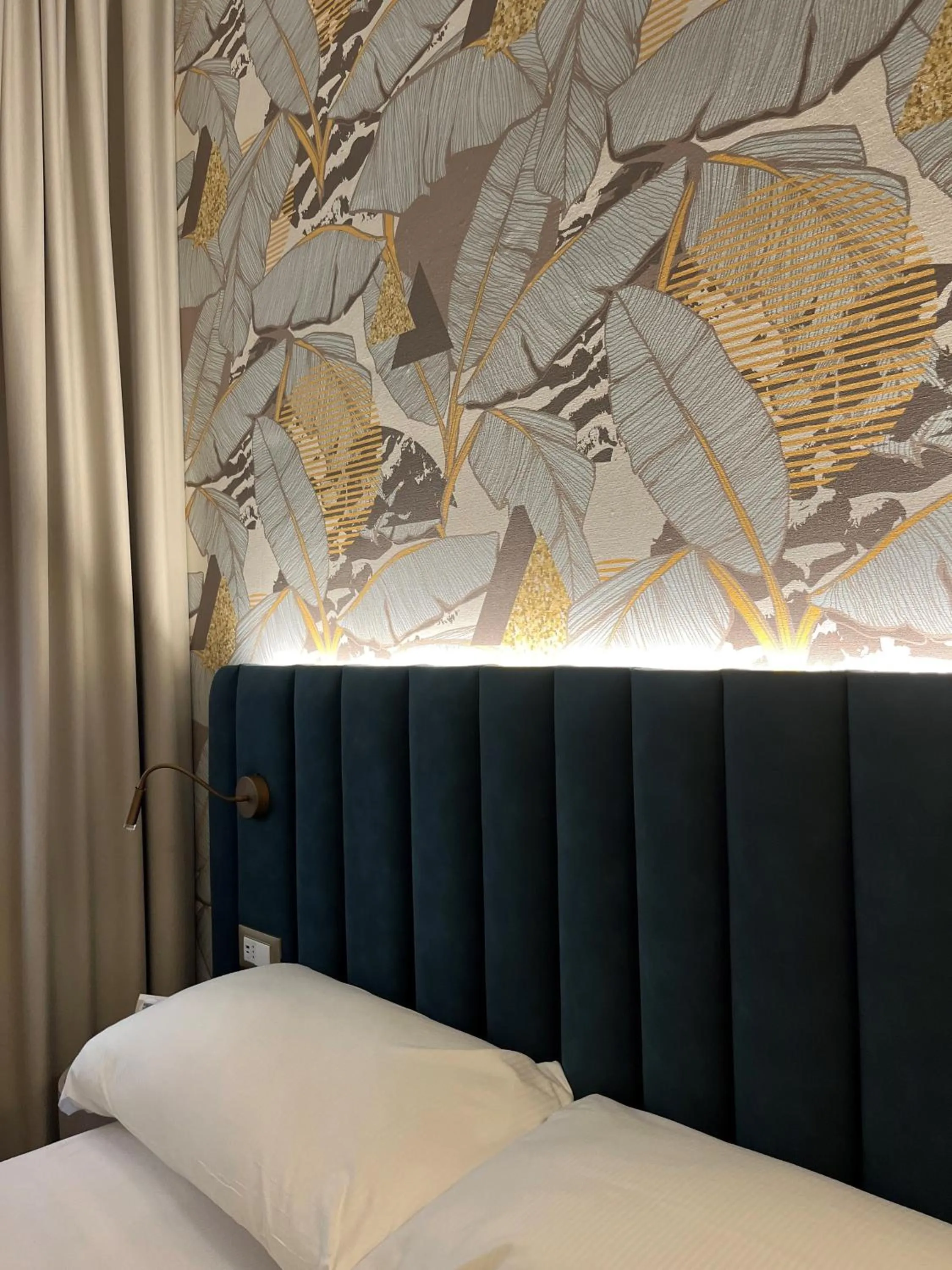 Bed in Lolli Palace Hotel