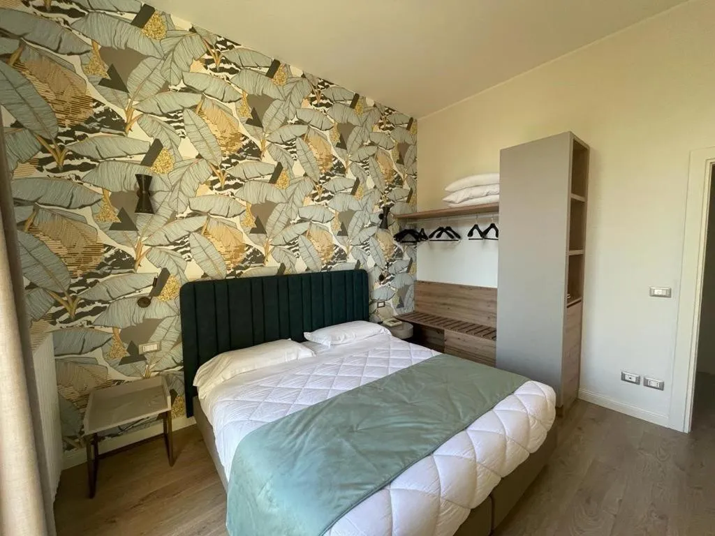 Bed in Lolli Palace Hotel