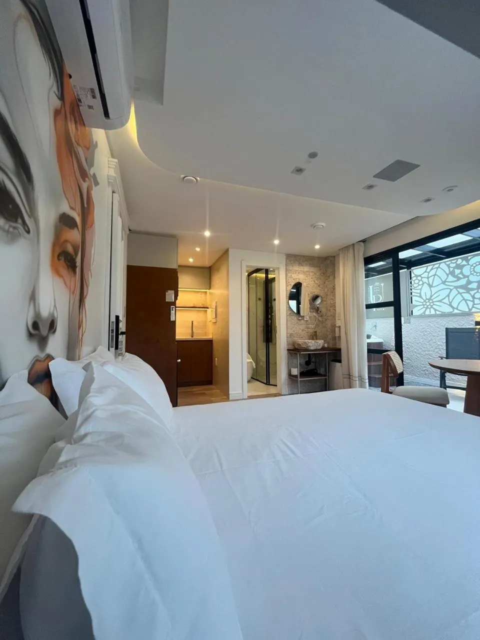 Bed in Up Hotel Boutique