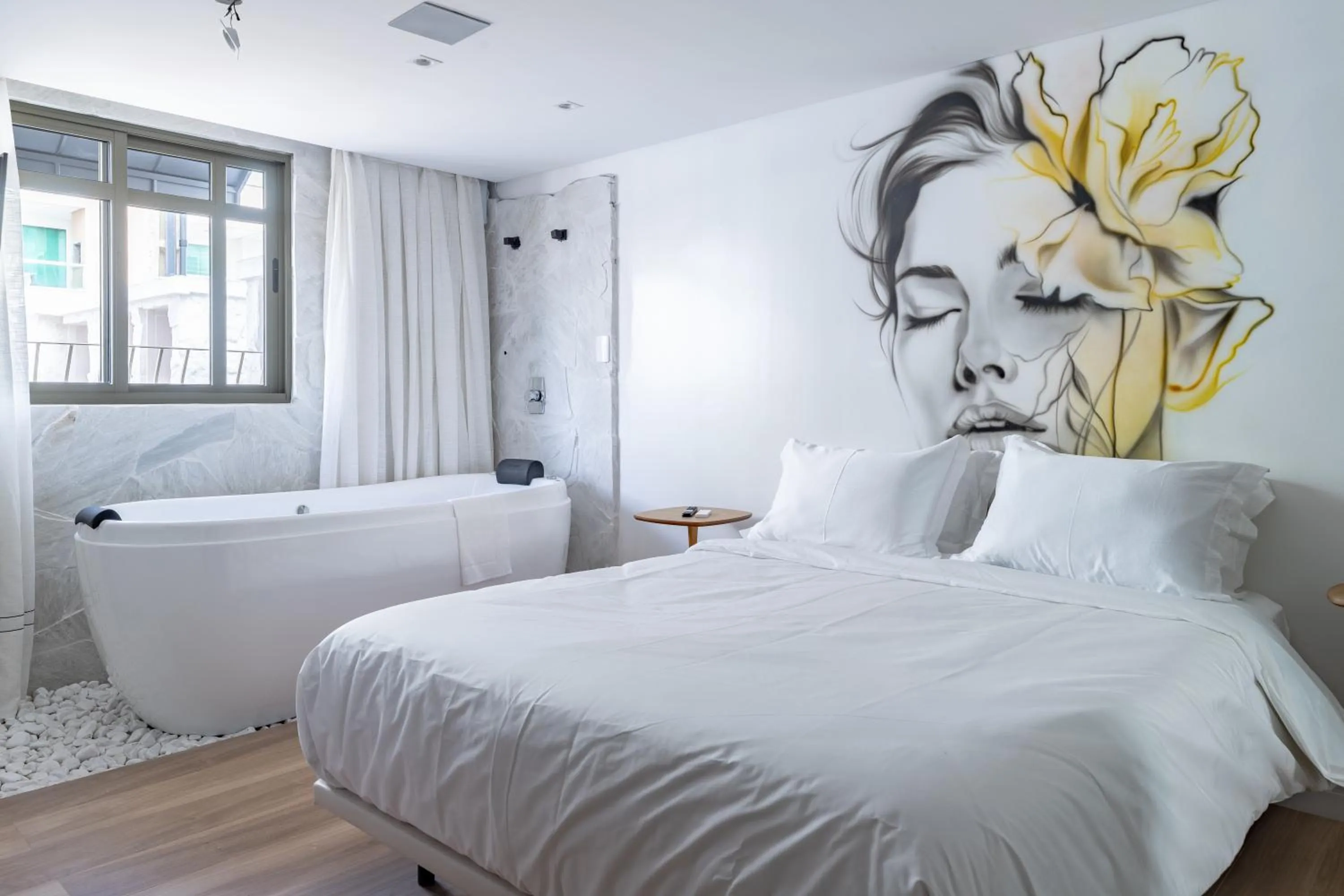 Bed in Up Hotel Boutique