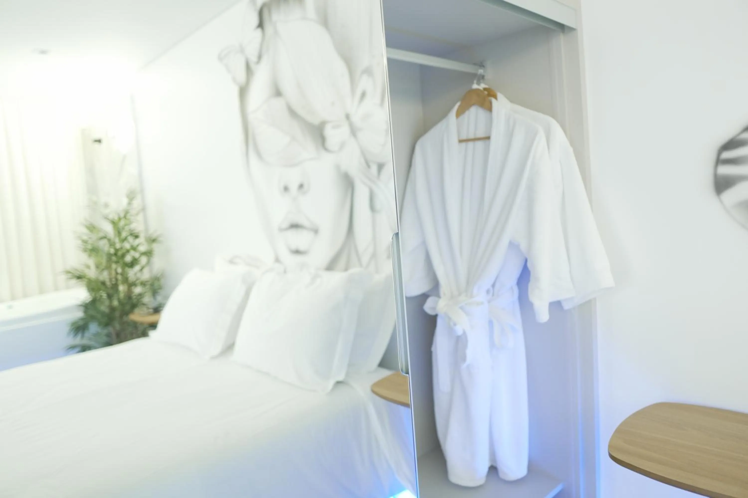 Bed in Up Hotel Boutique