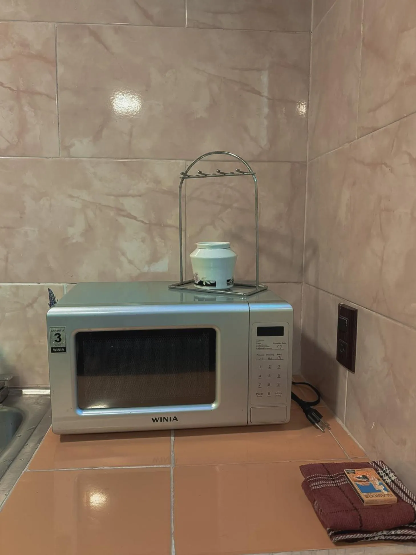 microwave in SiempreViva Hospedaje By GEstores