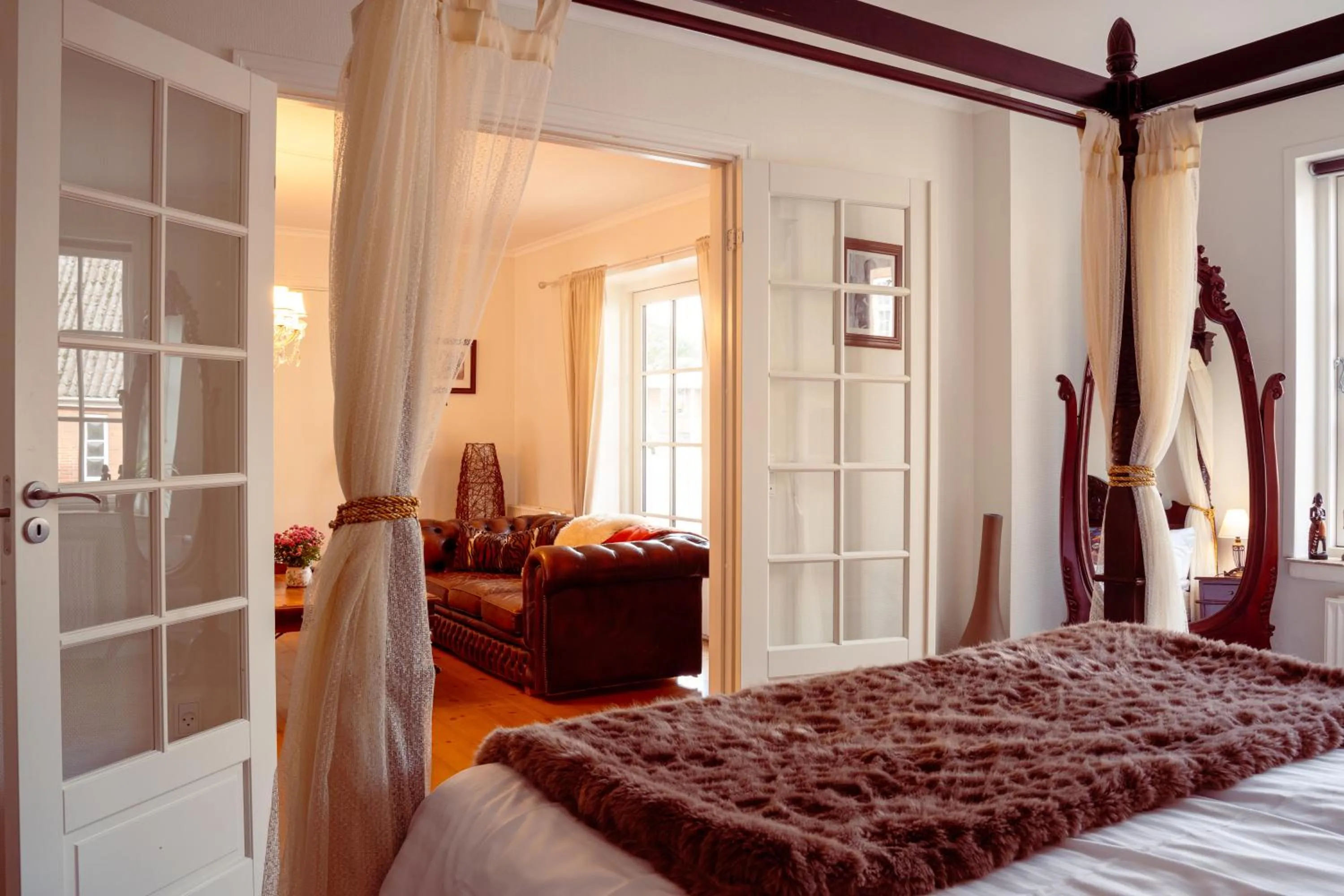 Bed in Boutique Hotel Postgården