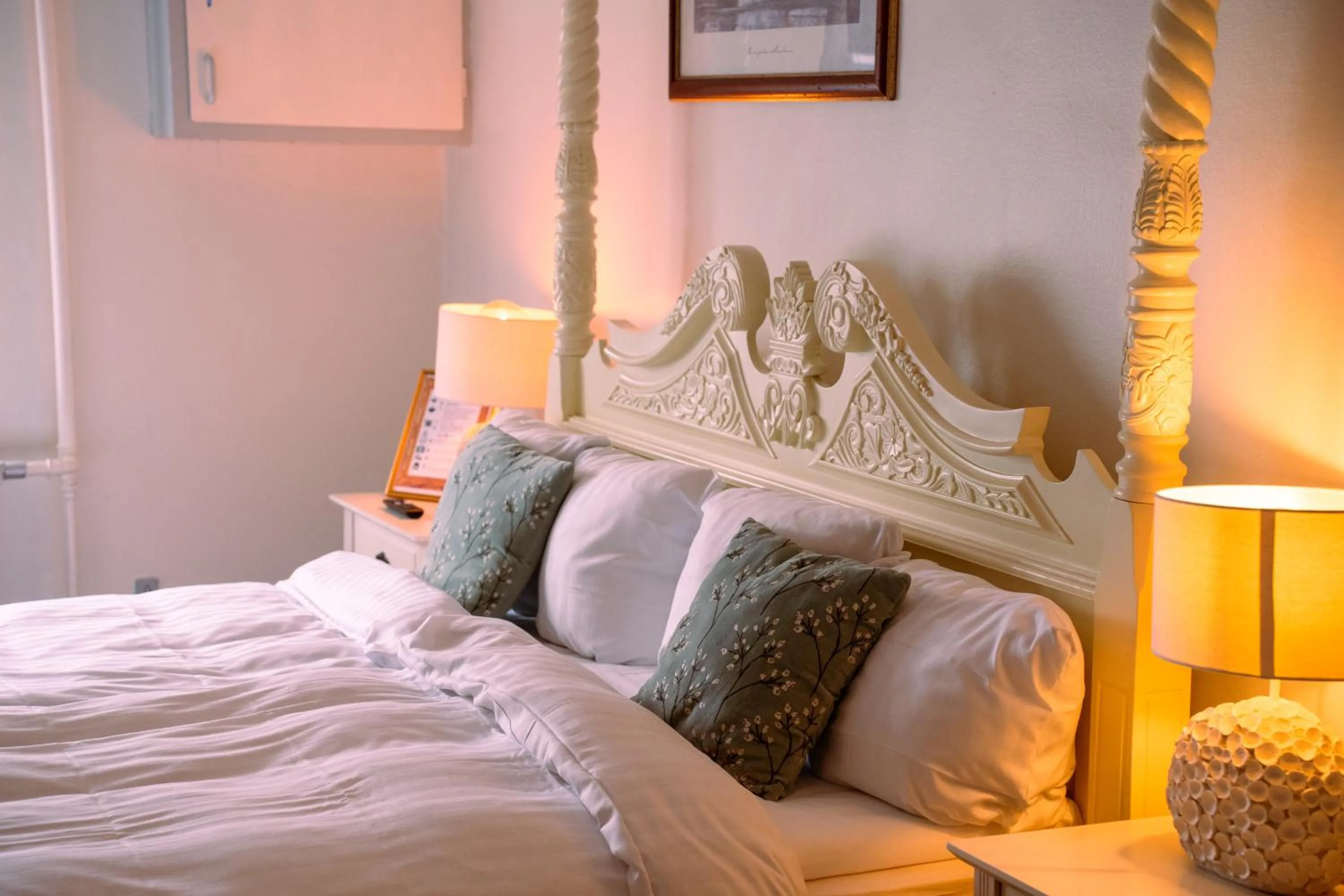 Bed in Boutique Hotel Postgården