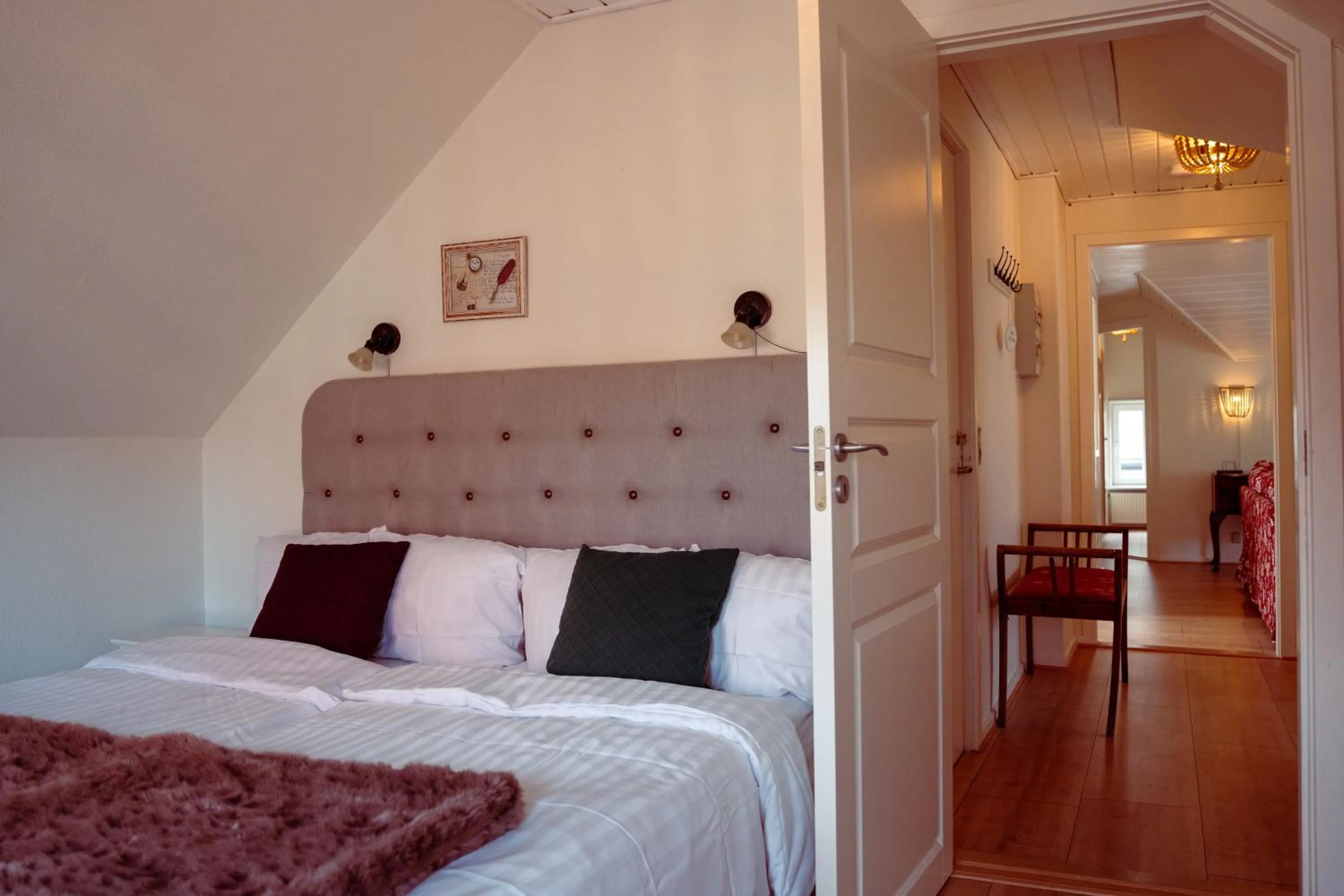 Bed in Boutique Hotel Postgården