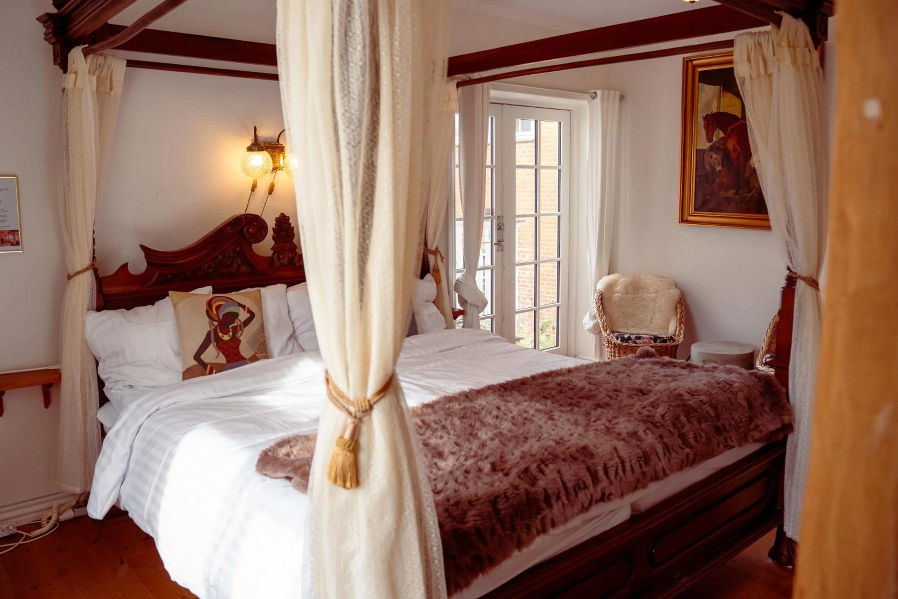 Bed in Boutique Hotel Postgården