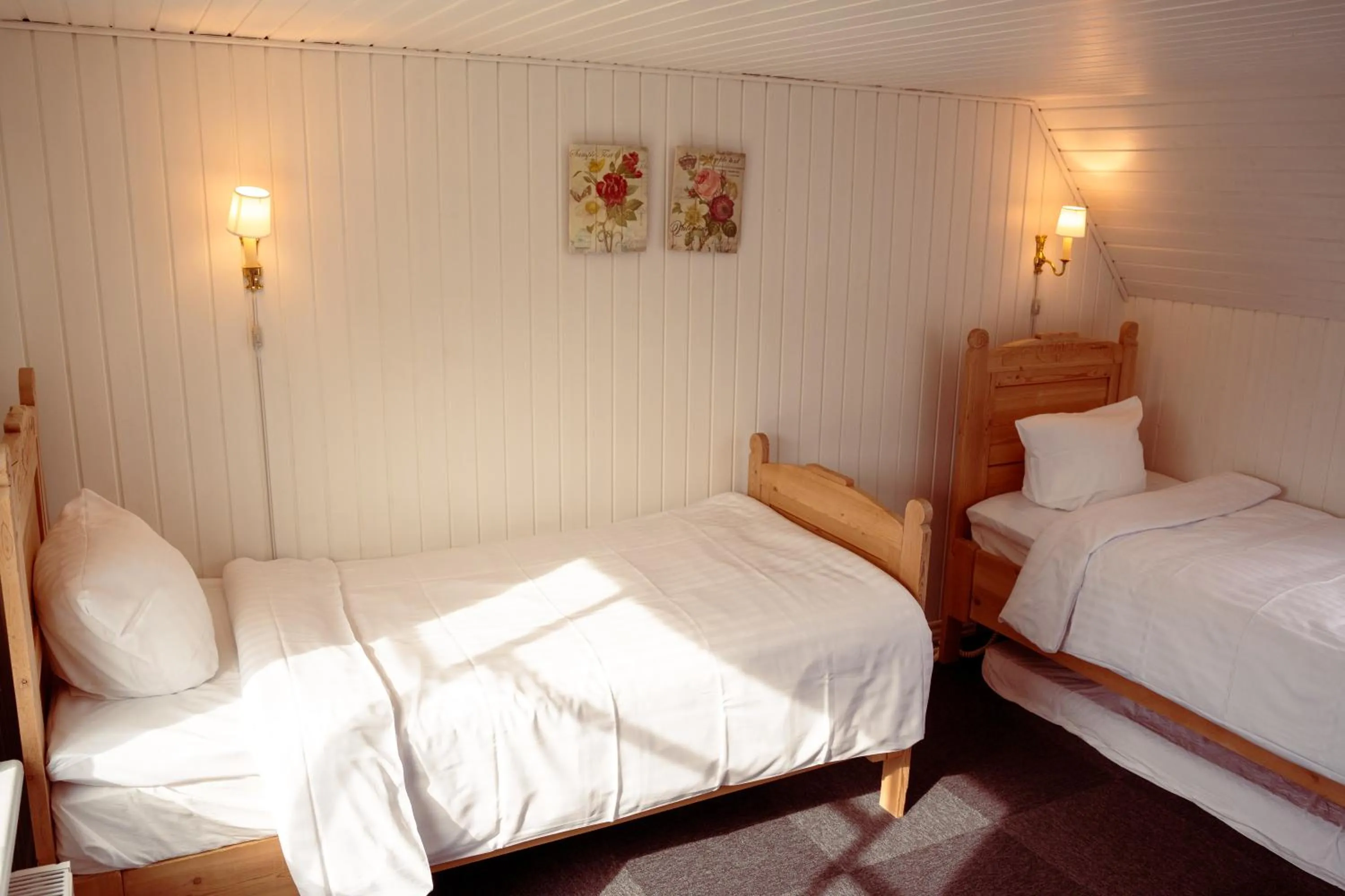 Bed in Boutique Hotel Postgården