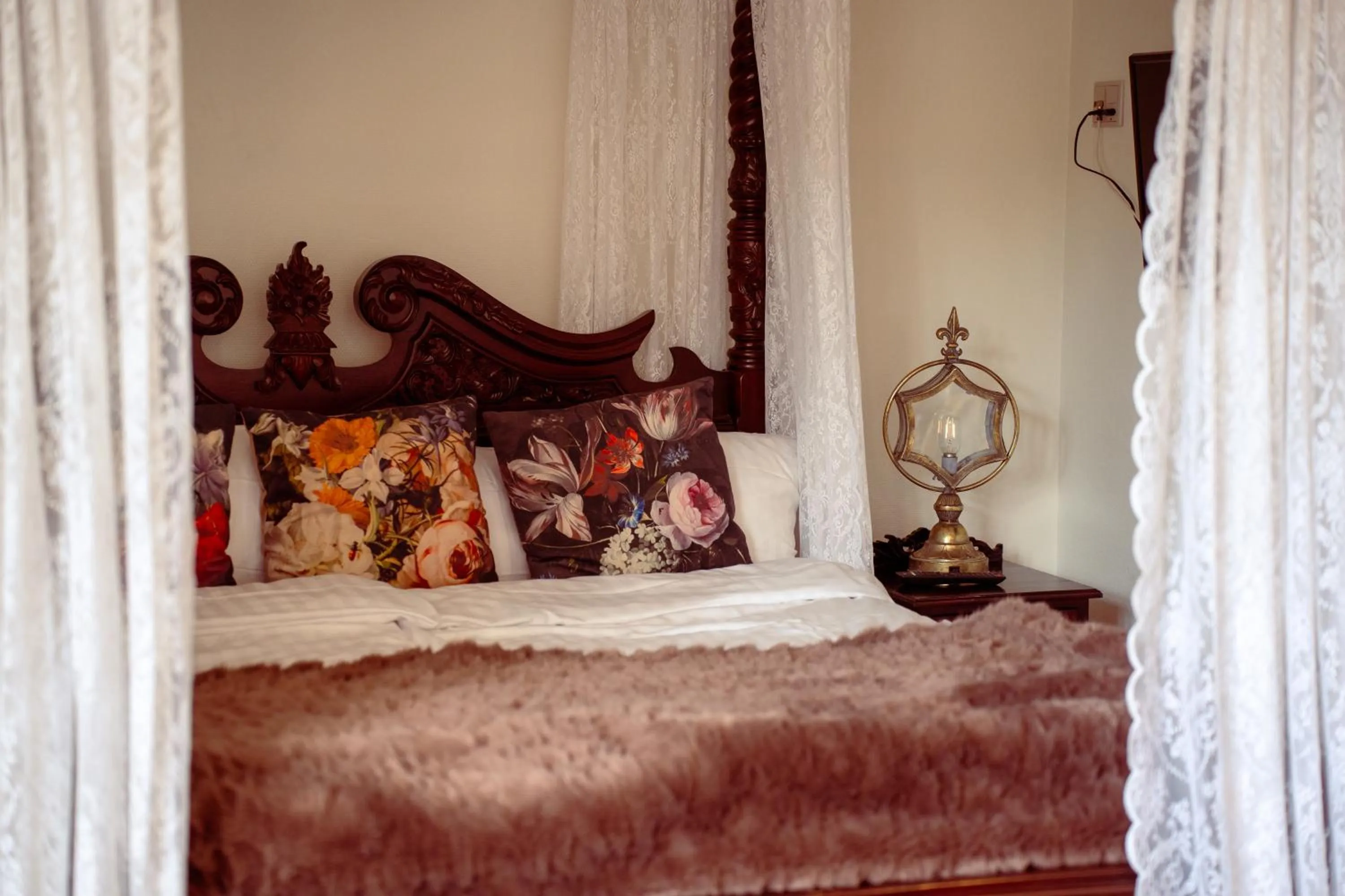 Bed in Boutique Hotel Postgården