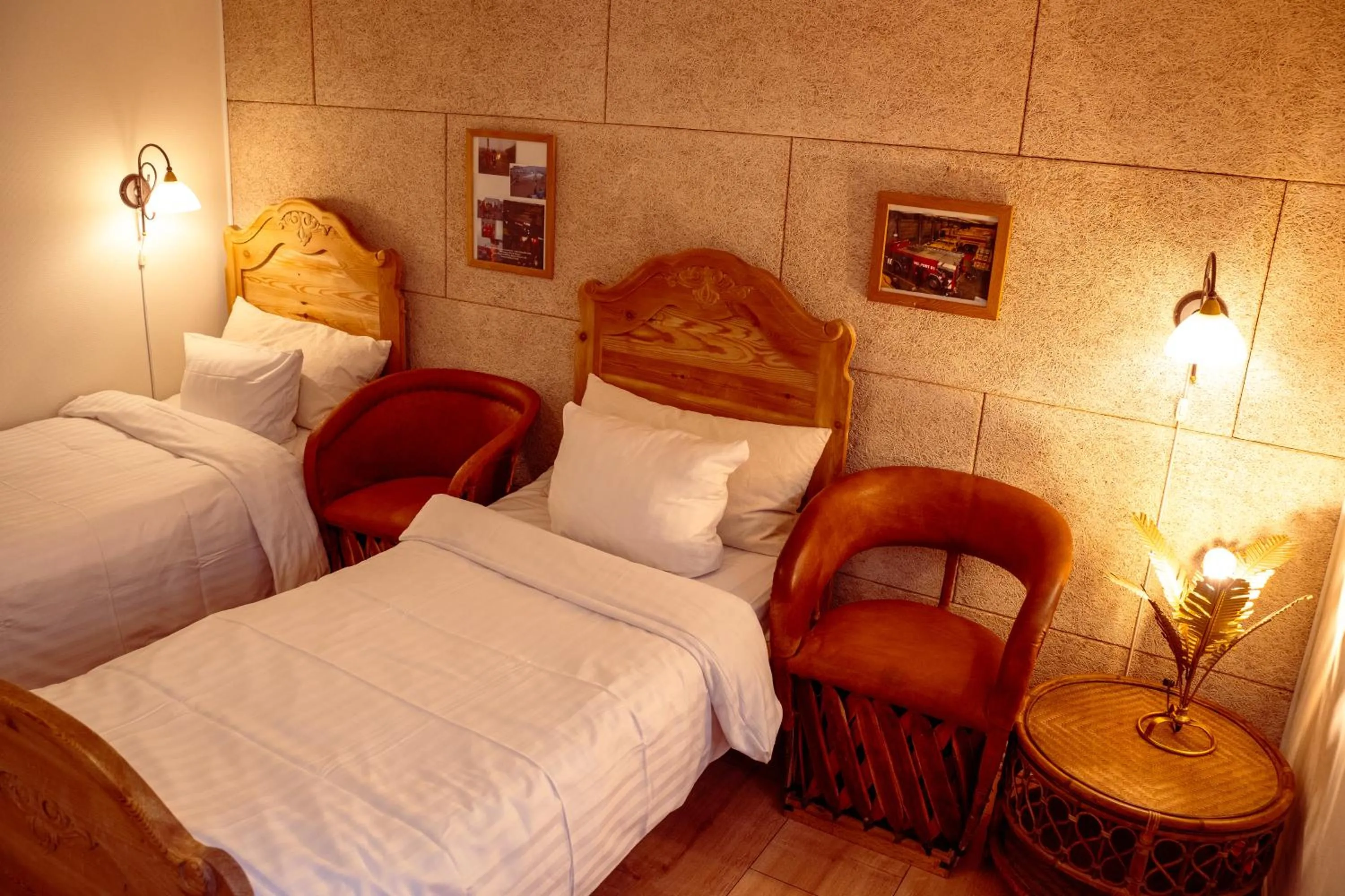 Bed in Boutique Hotel Postgården