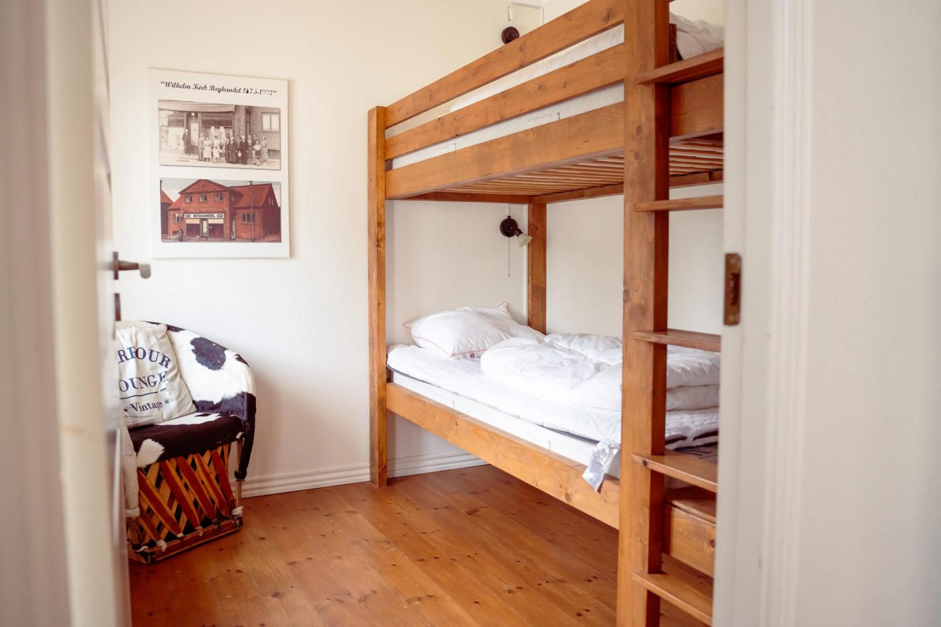 Bed in Boutique Hotel Postgården